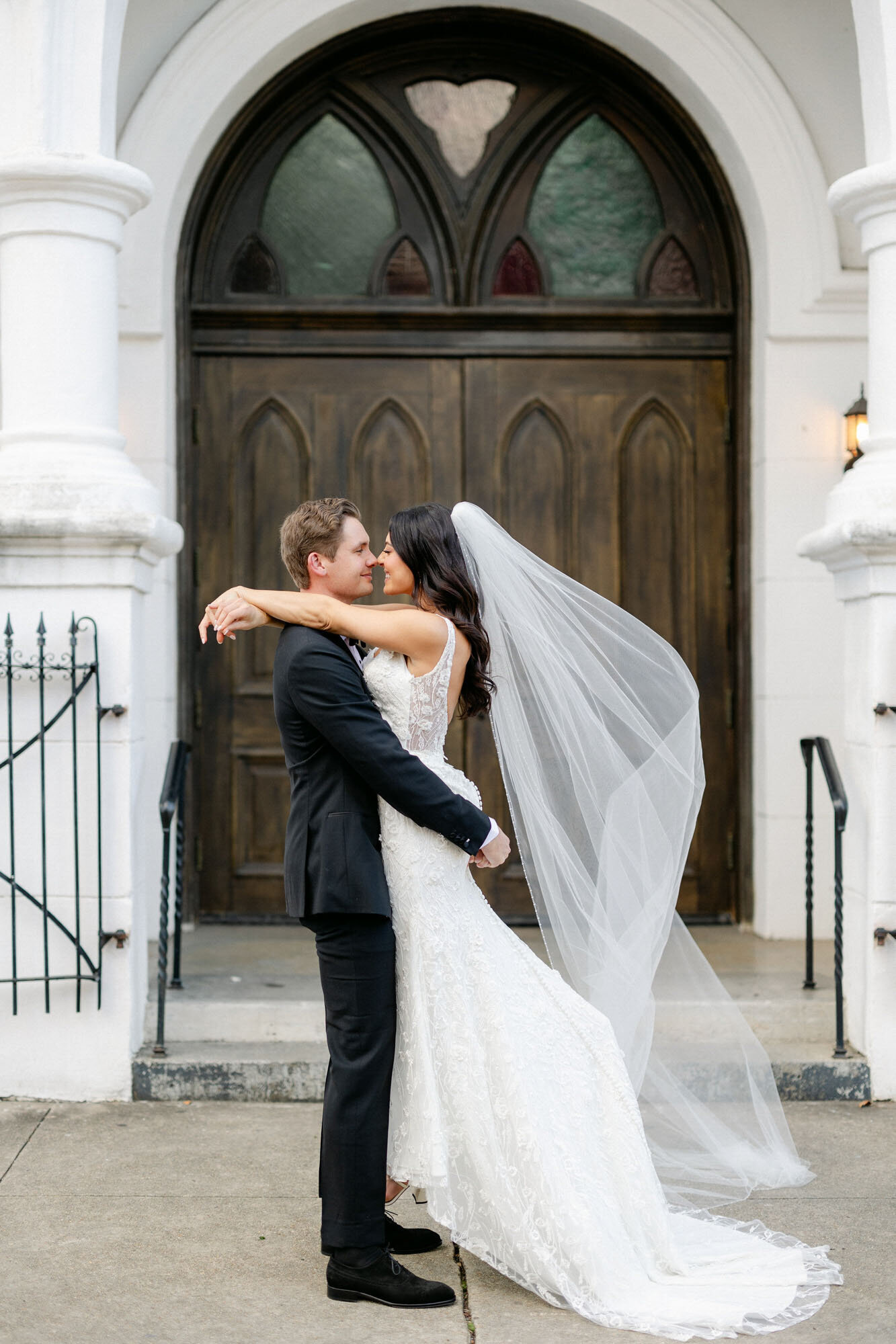 Gracie and Sean kissing in front of doors