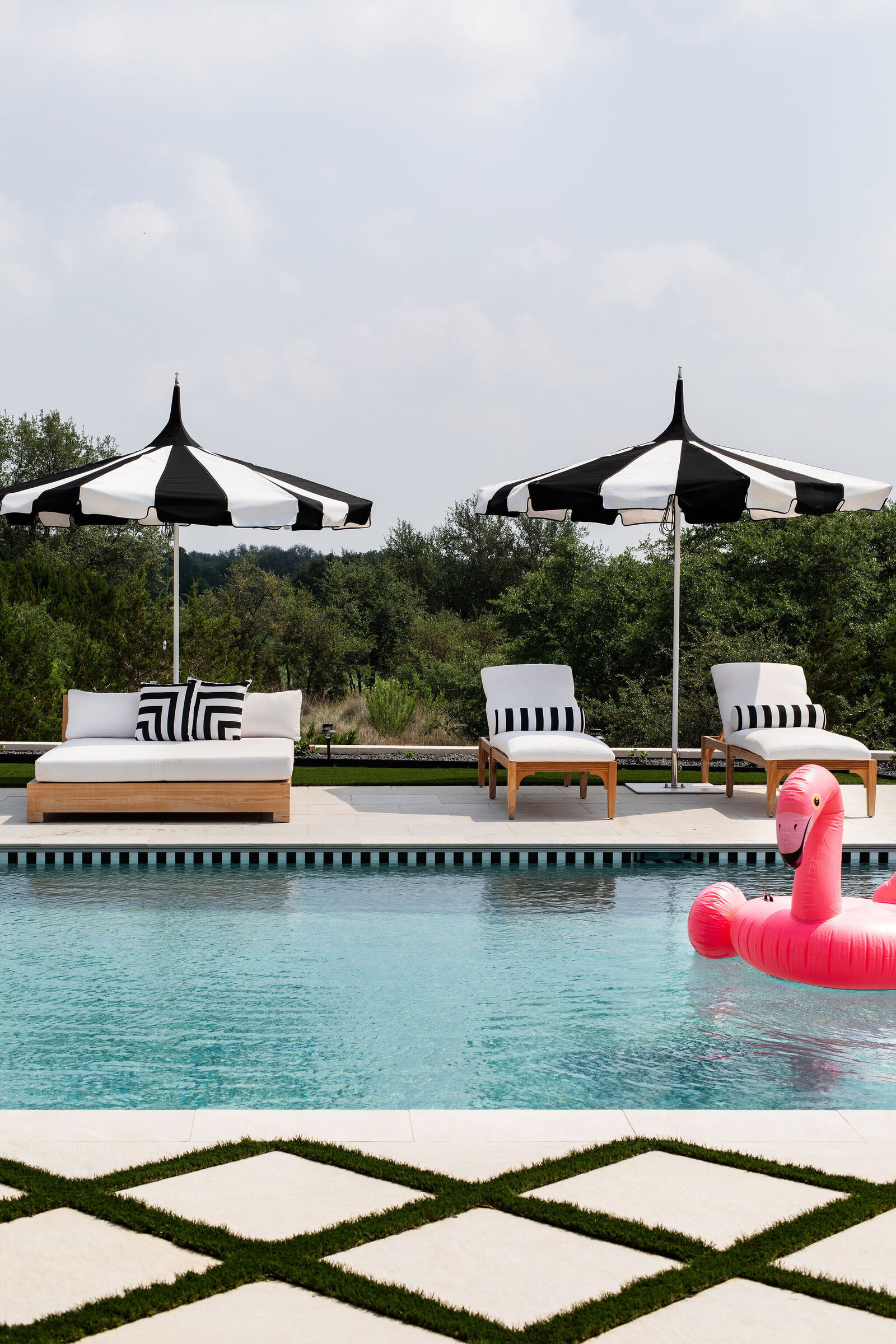 black+white+pool+umbrellas+flamingo+nuela+designs