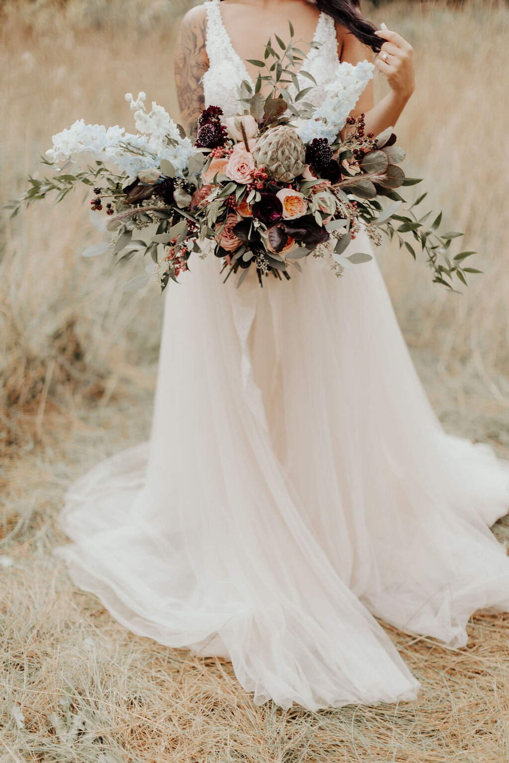 Boho bridal gown and bouquet