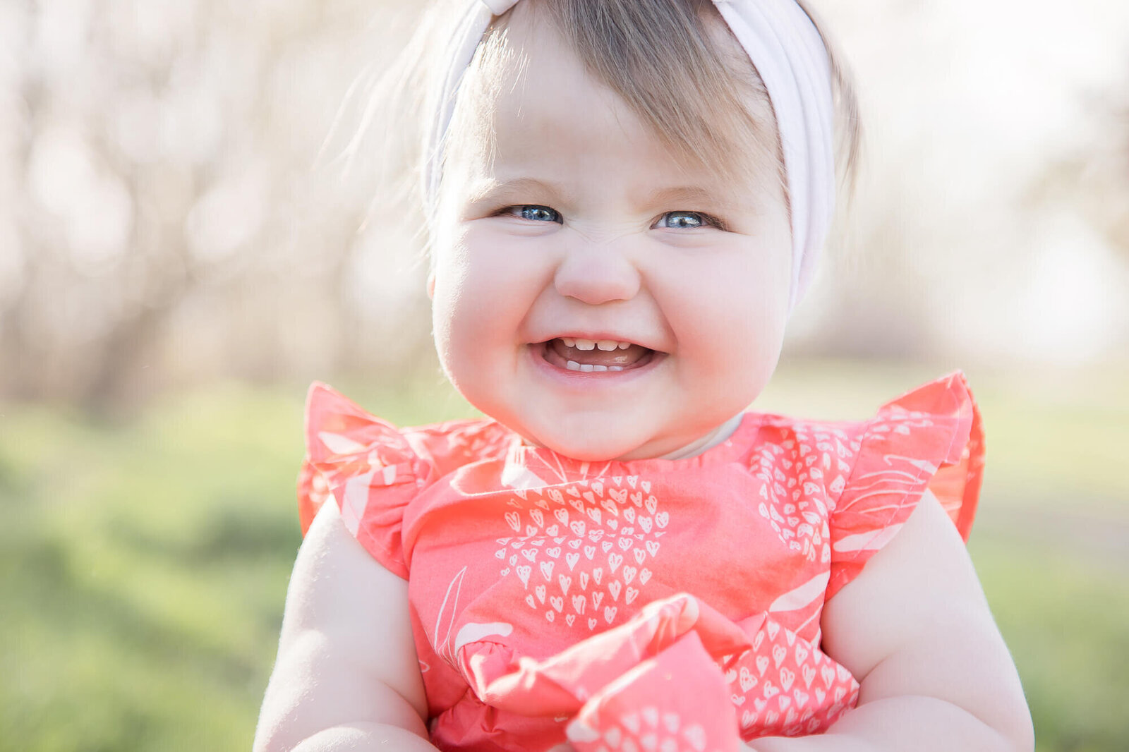 excited toddler girl during her 1 year milestone session