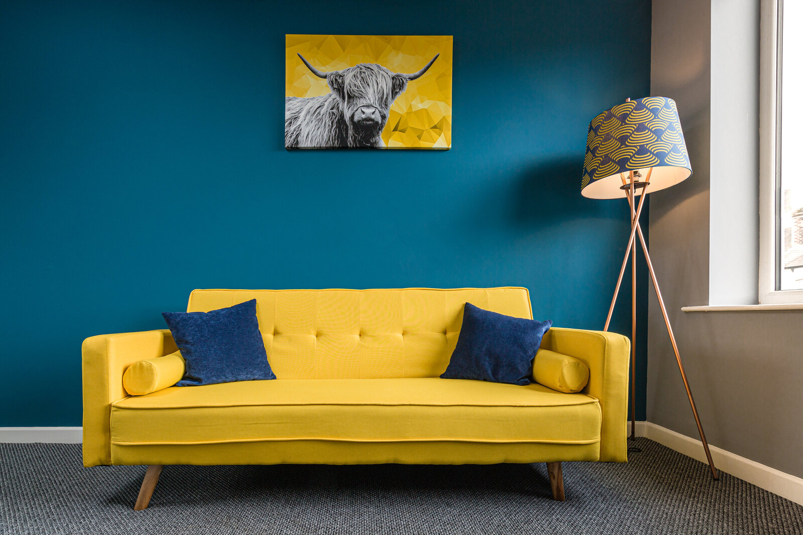 property photography serviced accomodation yellow couch