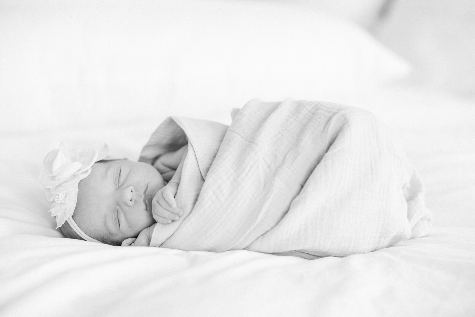 Cleveland Newborn Photographer In home newborn session swaddled baby