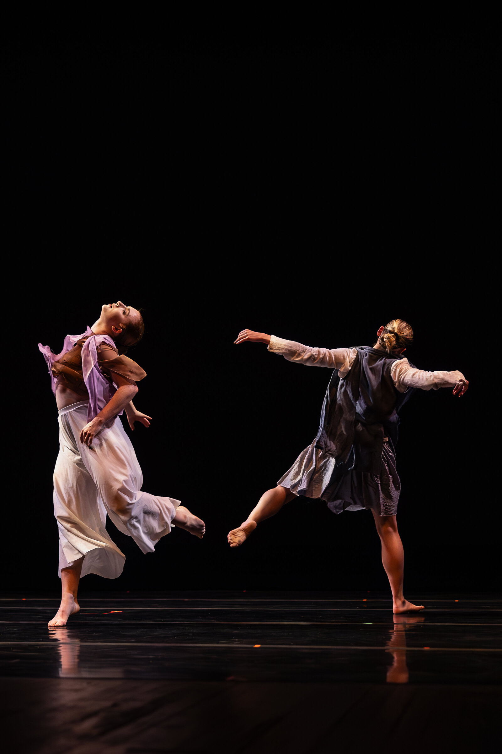 Two dancers dancing modern dance