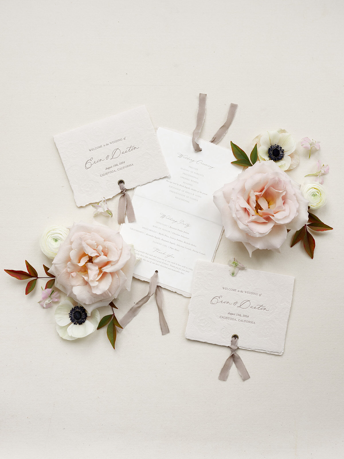 folded-wedding-programs-with-ribbon