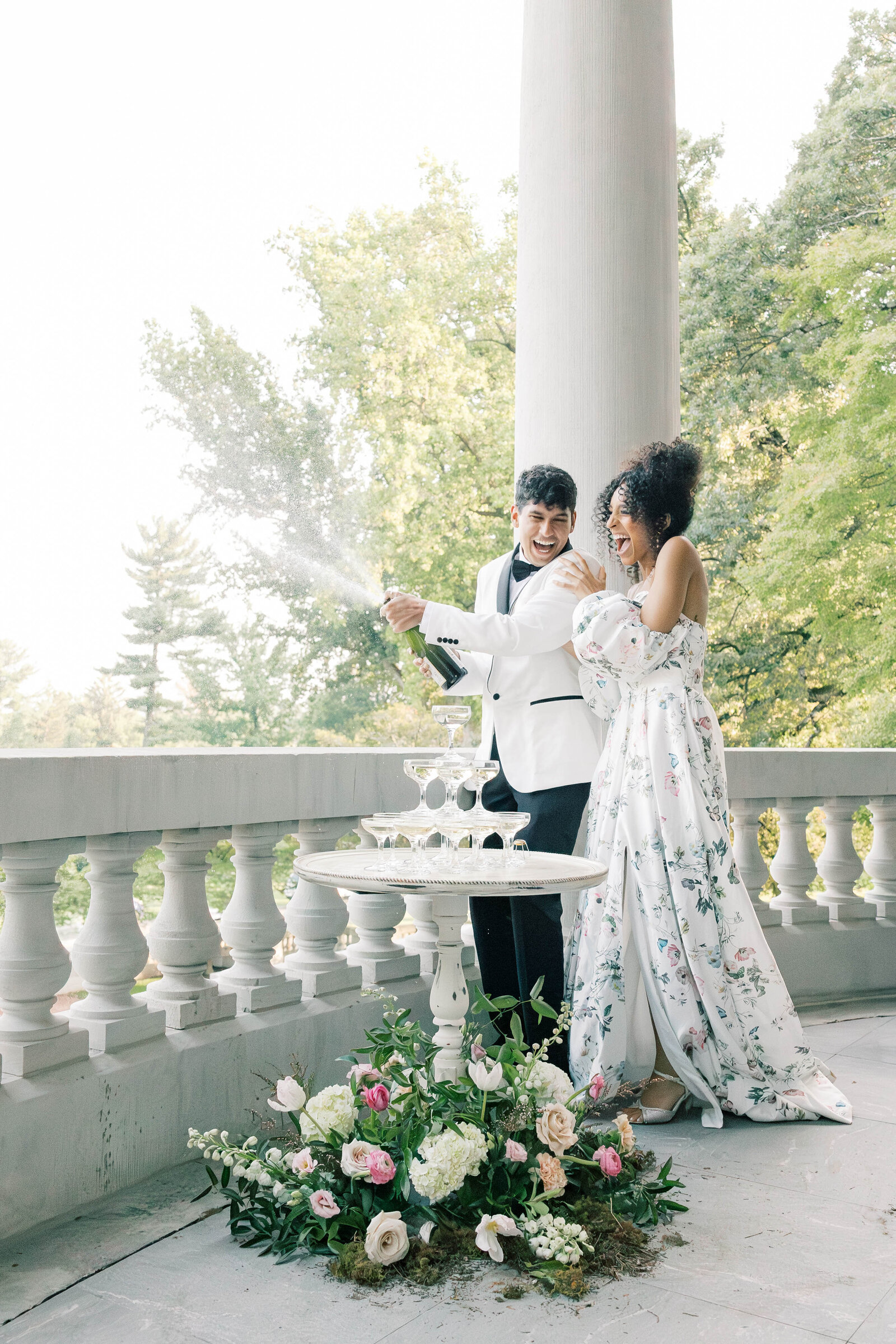 Light and airy wedding photo of a couple embracing at a luxury venue in NEPA.
