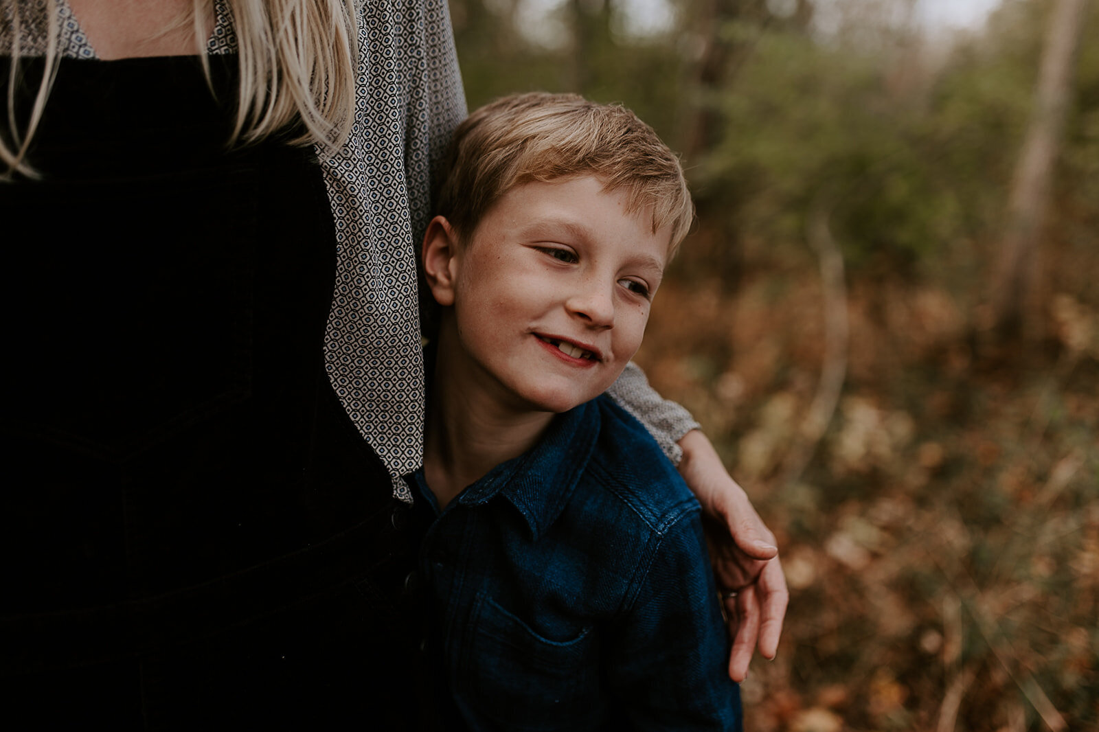 Smiling boy on a hiking trail at French Park in Cincinnati