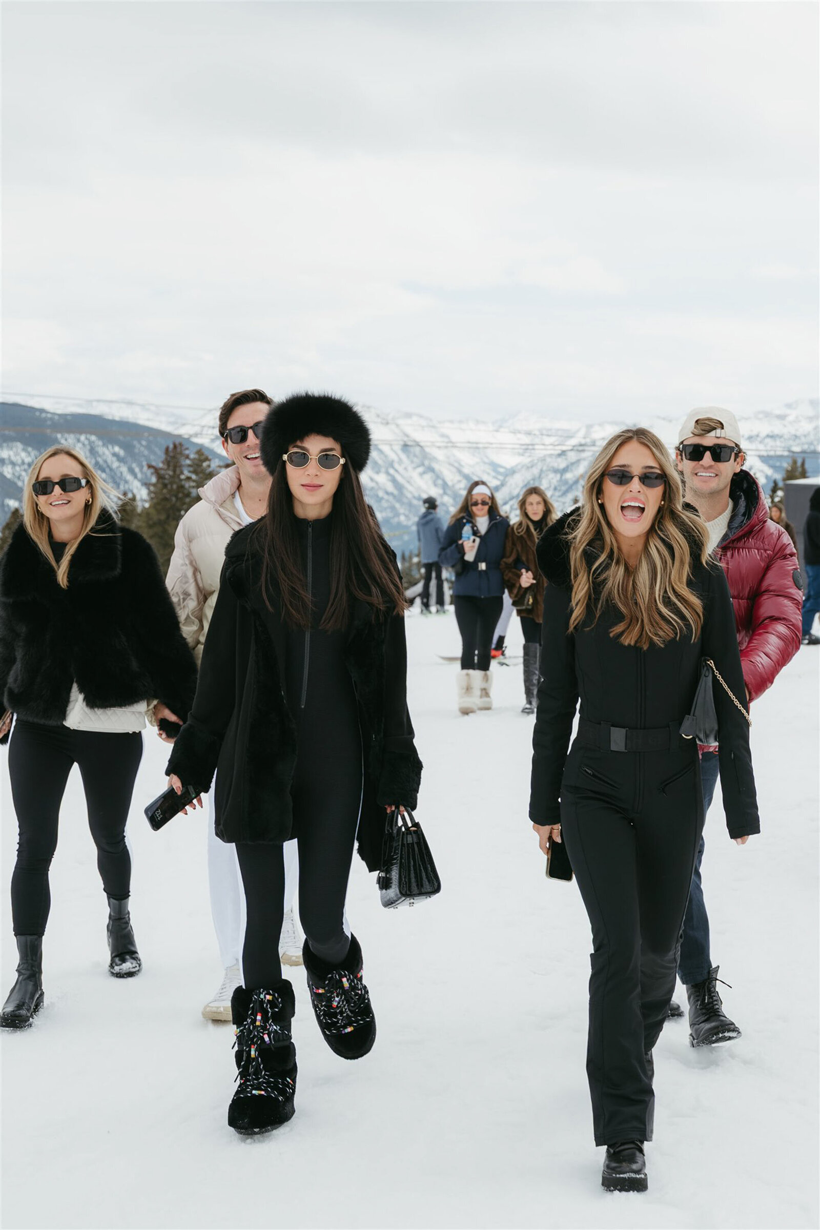 Stylish bride and groom at multi-day Aspen wedding with upscale decor and alpine scenery