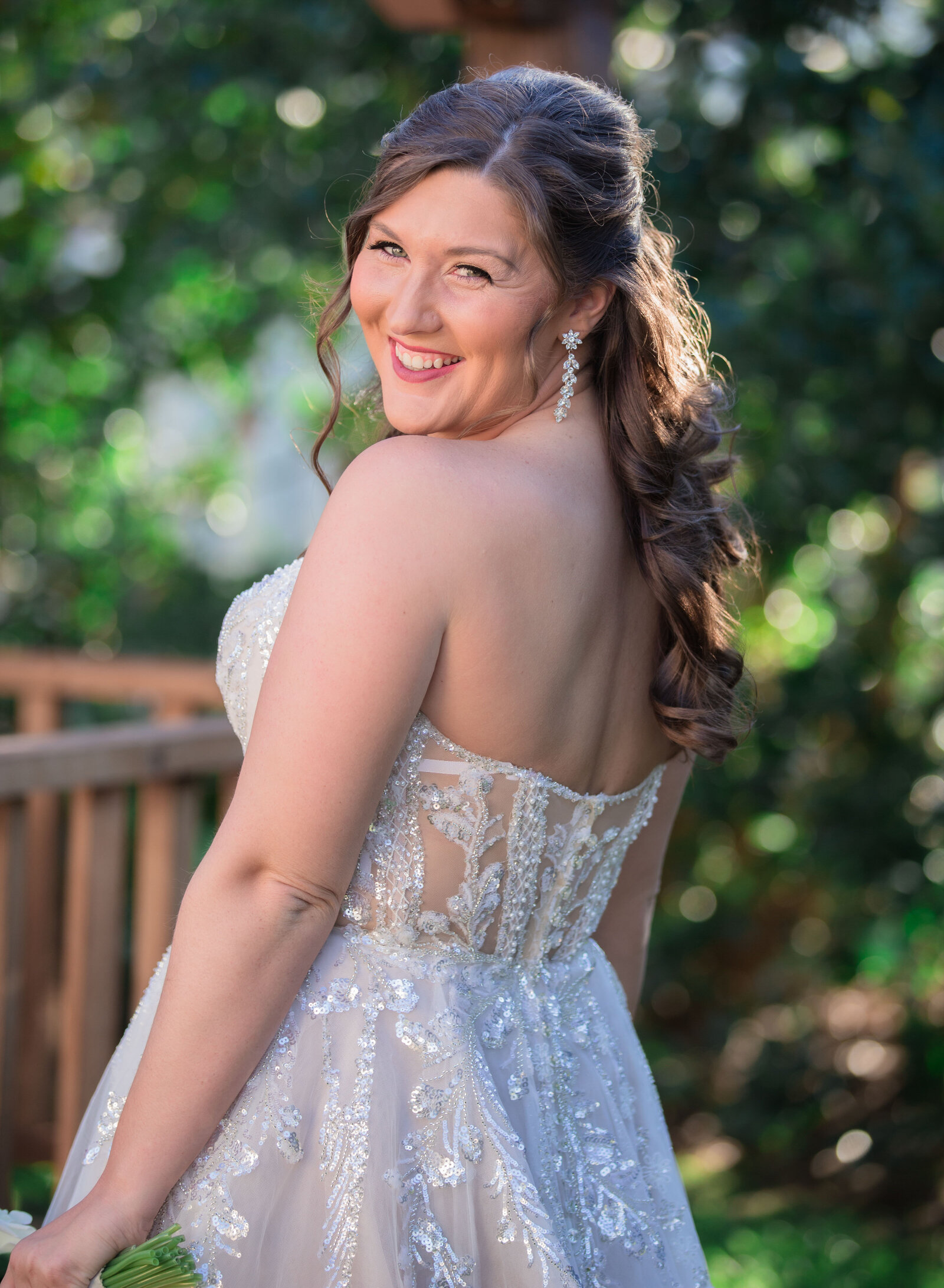 happy bride looking over her shoulder