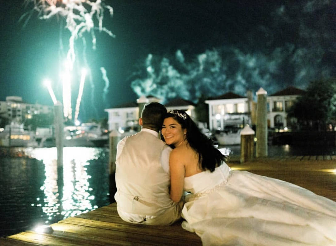 Venue on Dock with Wedding Couple looking at Fireworks at Palafox Wharf Waterfront Best wedding venue on Palafox