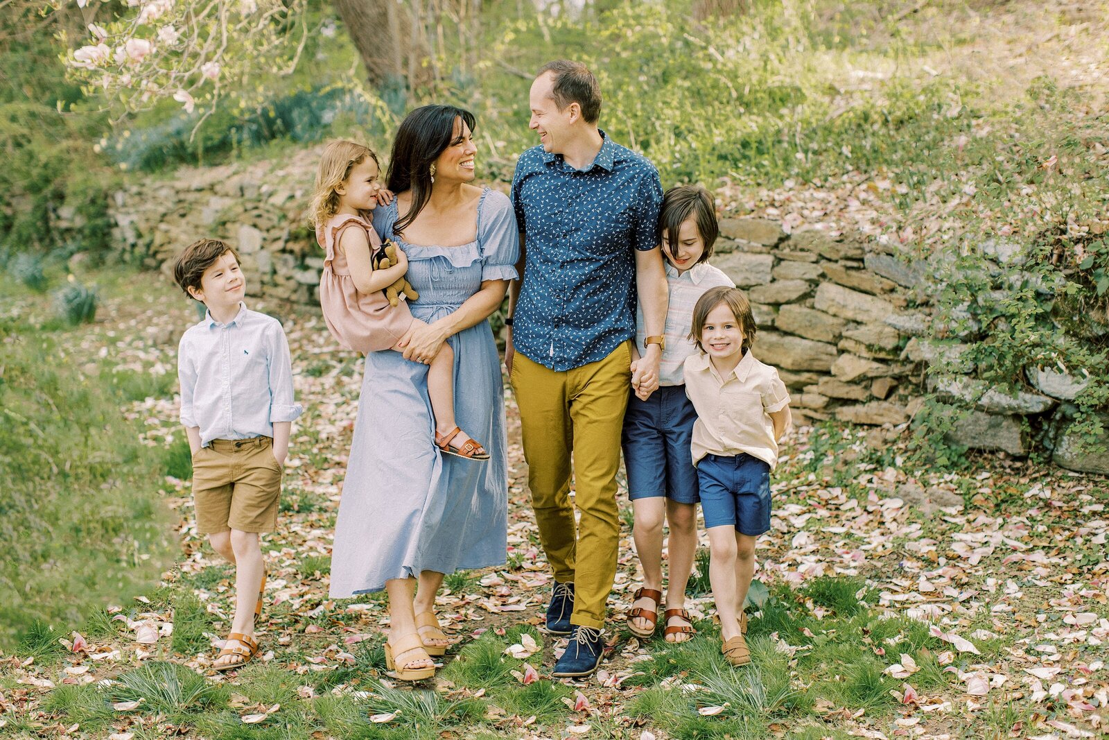 family of six walking in family portrait by Philadelphia Family Photographer
