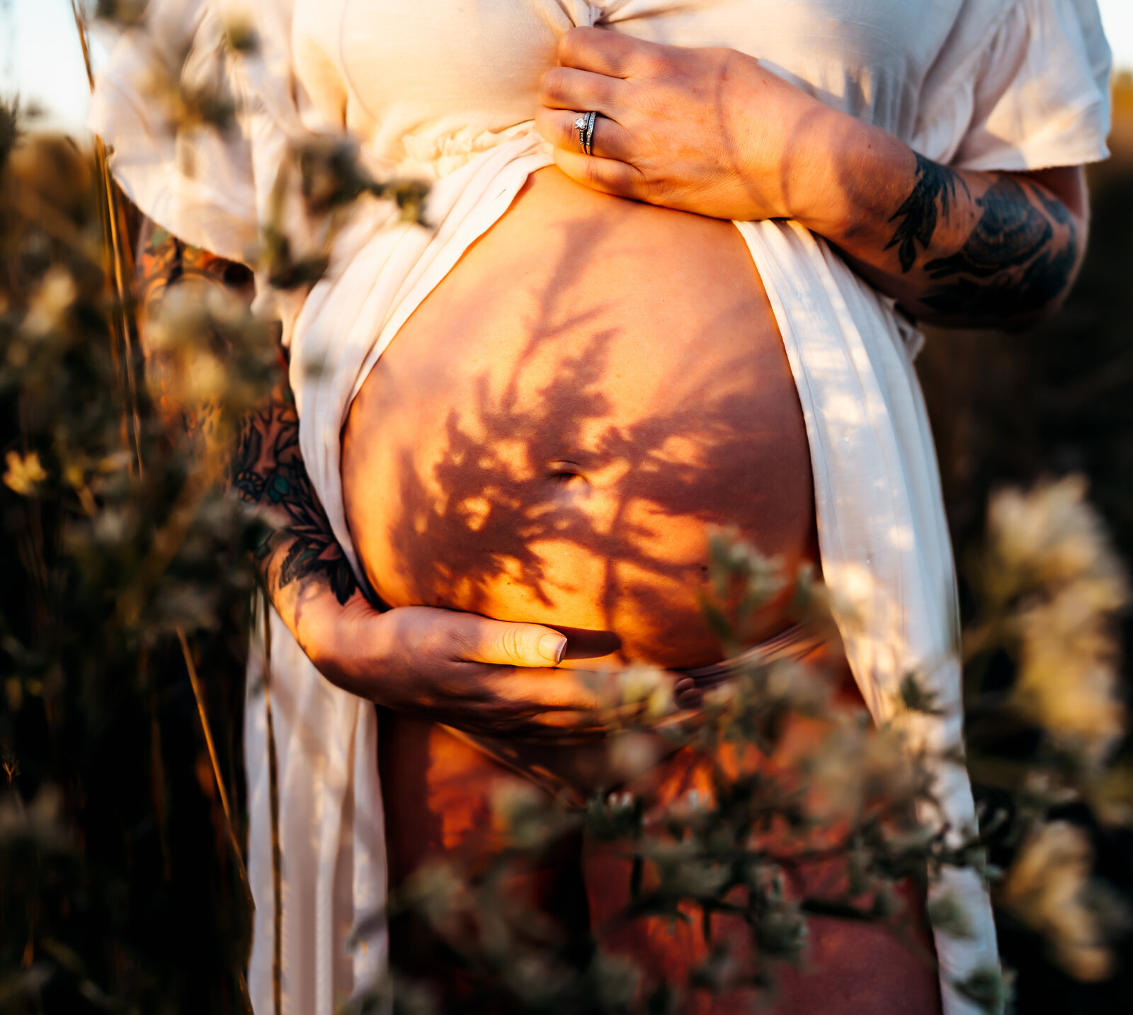 pregnant belly with flower shadows