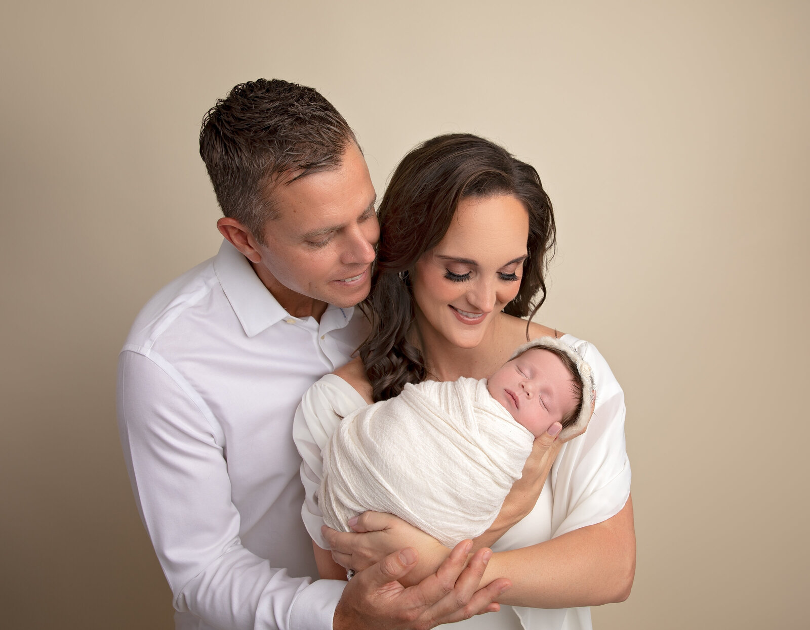 Celebrate your growing family with beautiful newborn and family portraits, capturing love, joy, and togetherness in every frame.