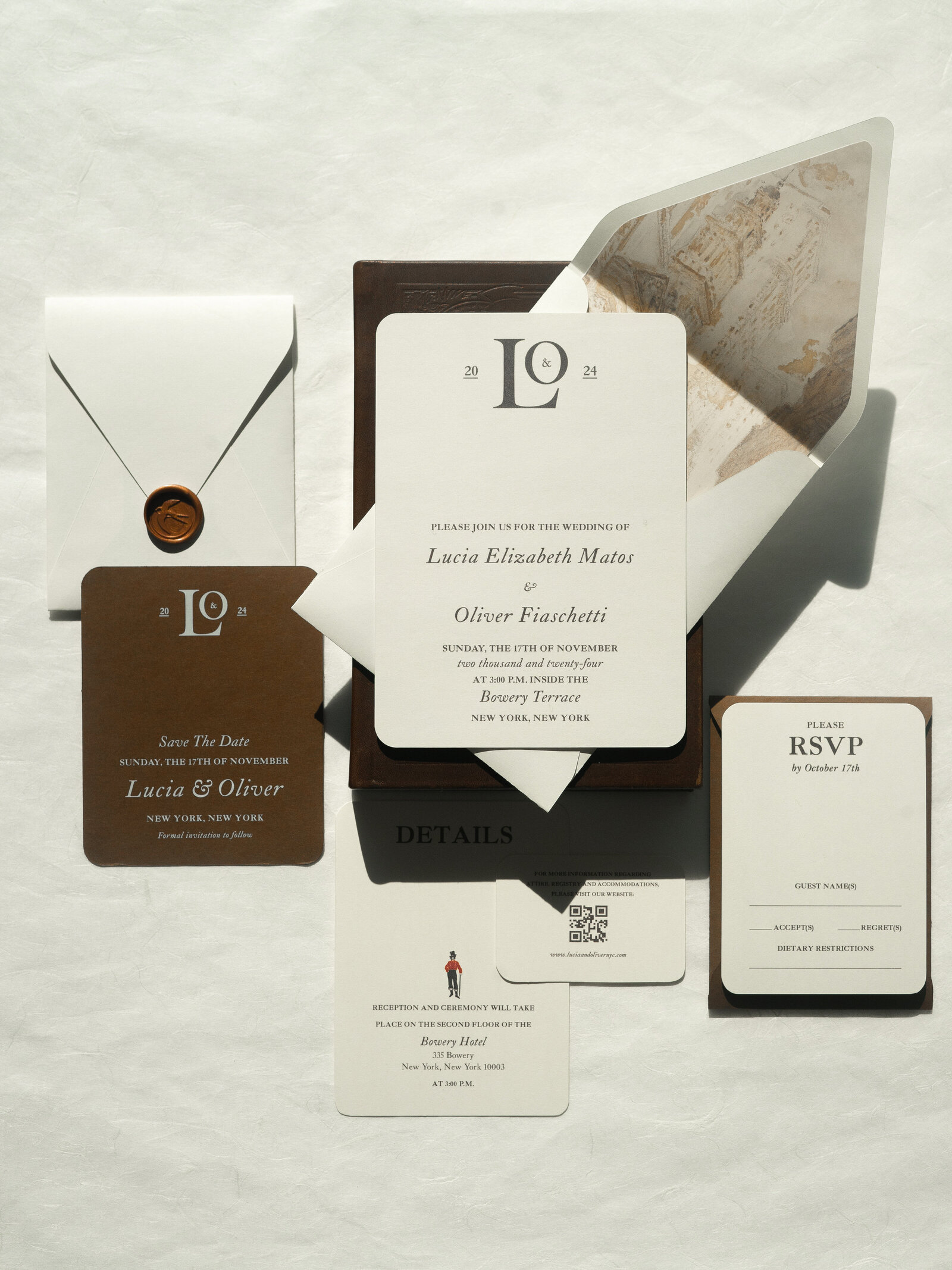 Elegant wedding invitations by The Layout Collective.