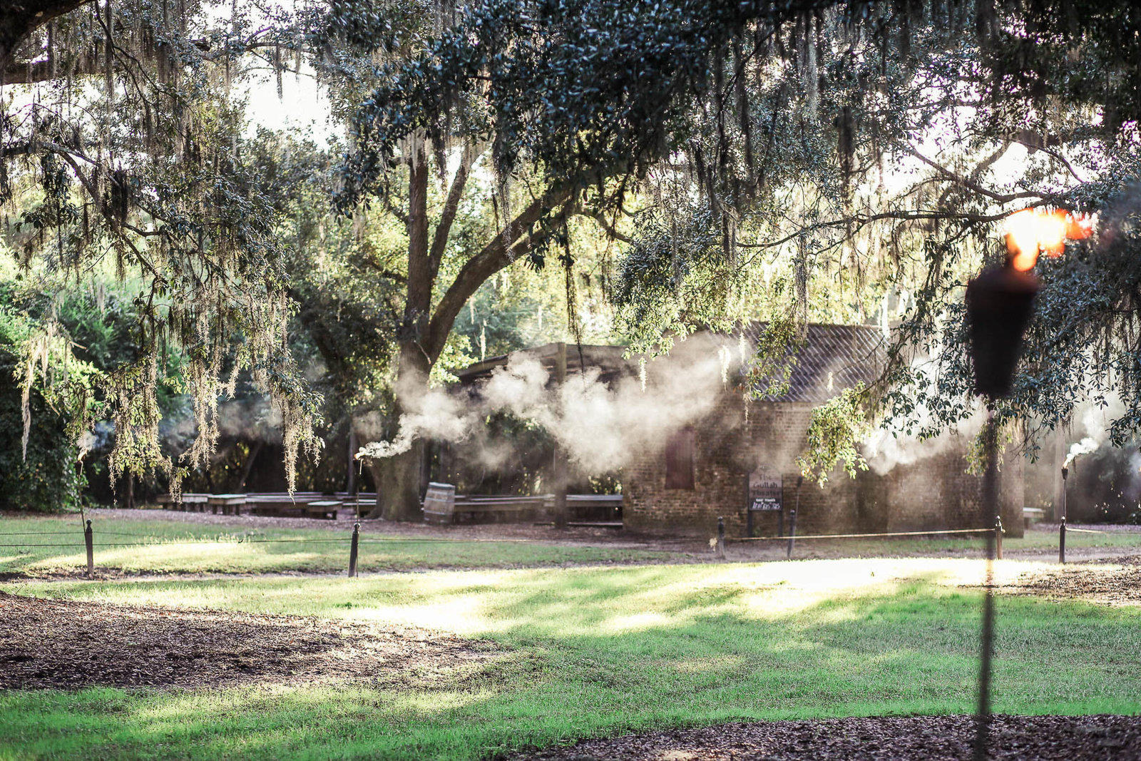 Torches smoke through fields, Boone Hall Plantation, Charleston, South Carolina