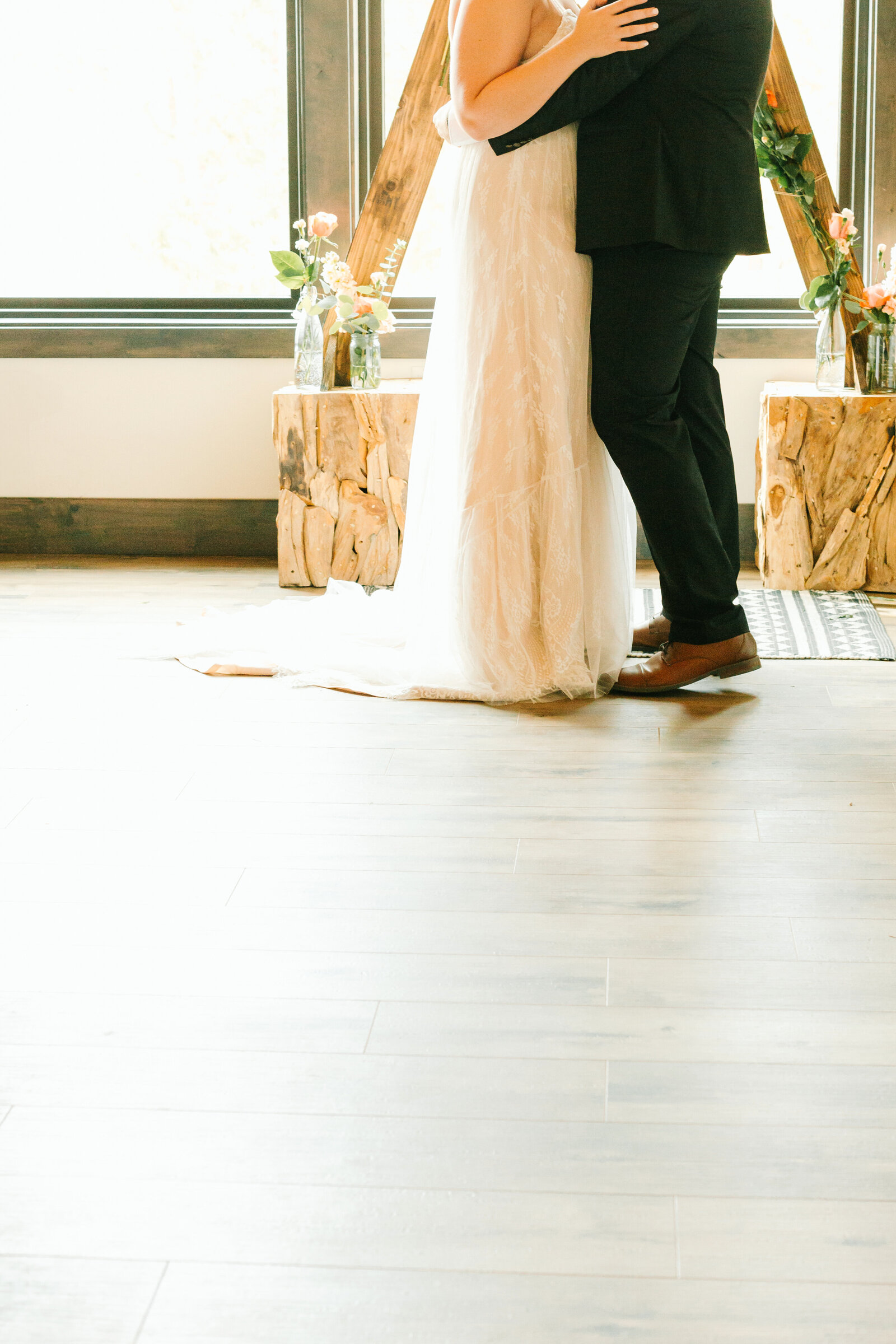 A couple celebrates their intimate elopement at a cabin at Big Bear Lake, California.