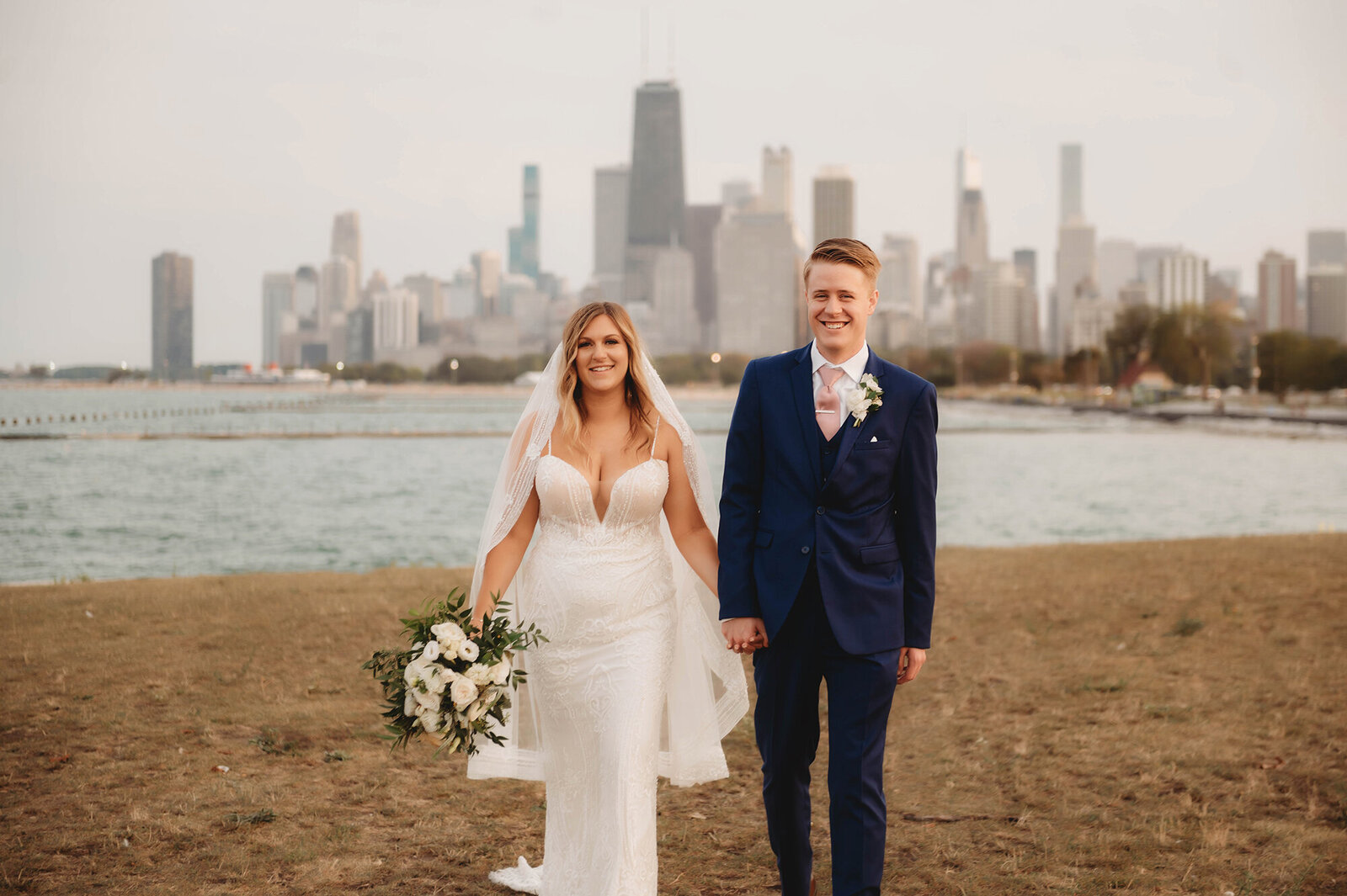 Bride & Groom pose for newlywed portraits after their Micro-Wedding in Chicago, IL.