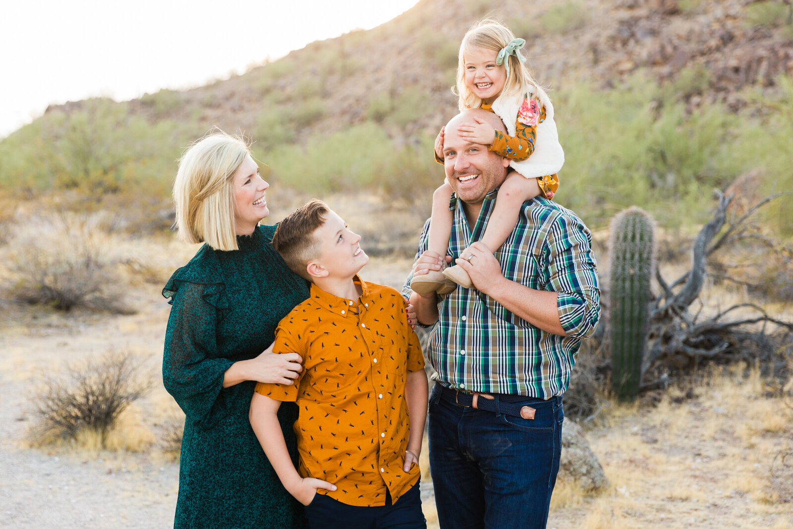 family smiling together in Phoenix photography session