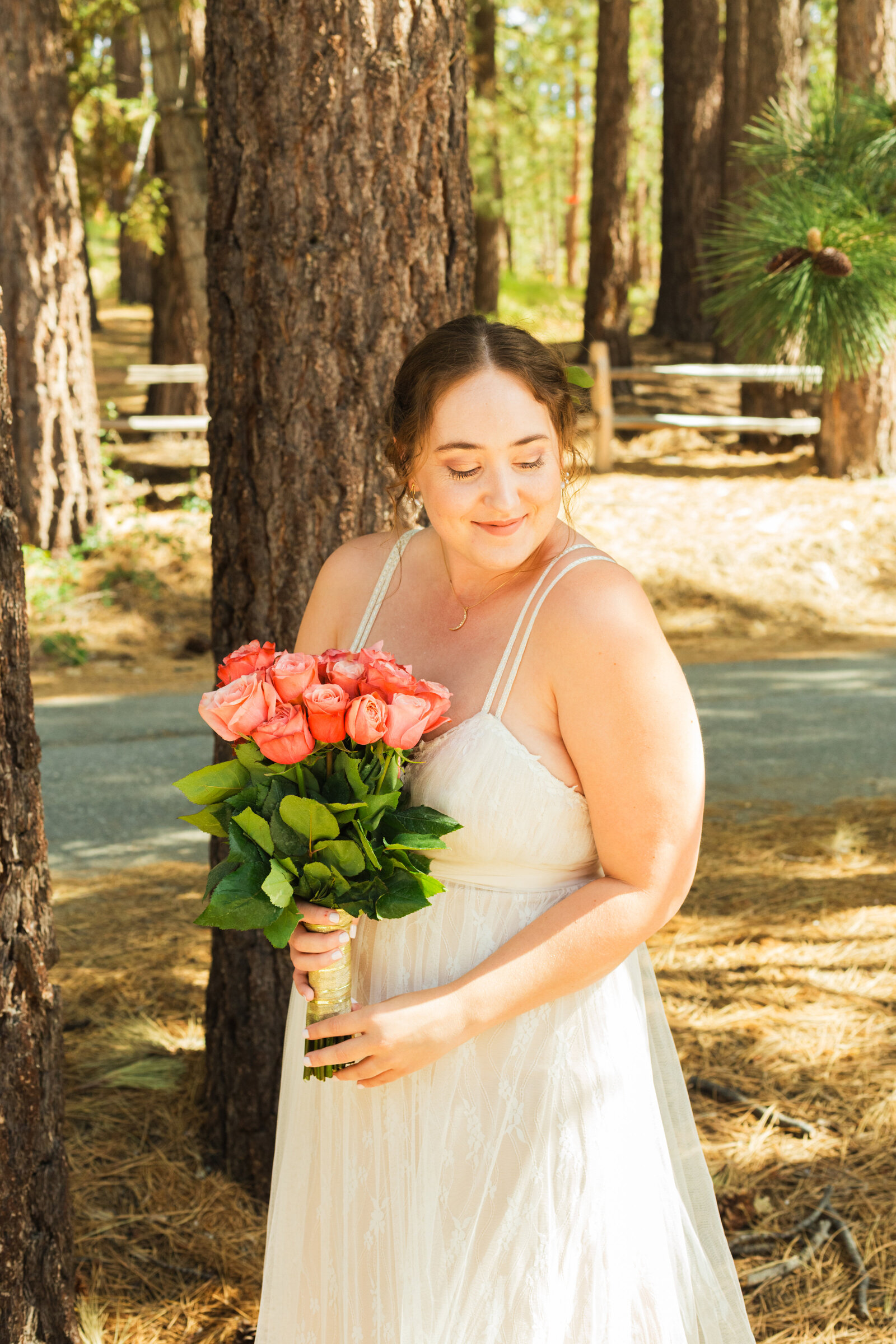 A boho bride celebrates her intimate elopement at a cabin at Big Bear Lake, California.