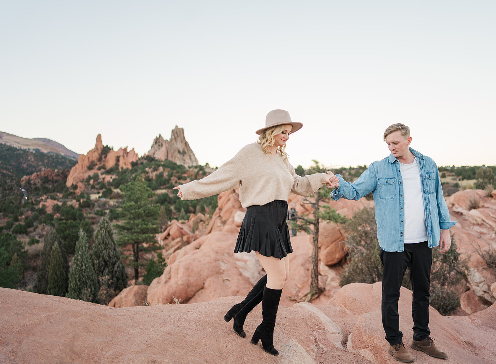 Take your engagement photos to new heights with an outdoor session featuring stunning mountain views. Sam Immer Photography will create a personalized experience that showcases your unique connection.