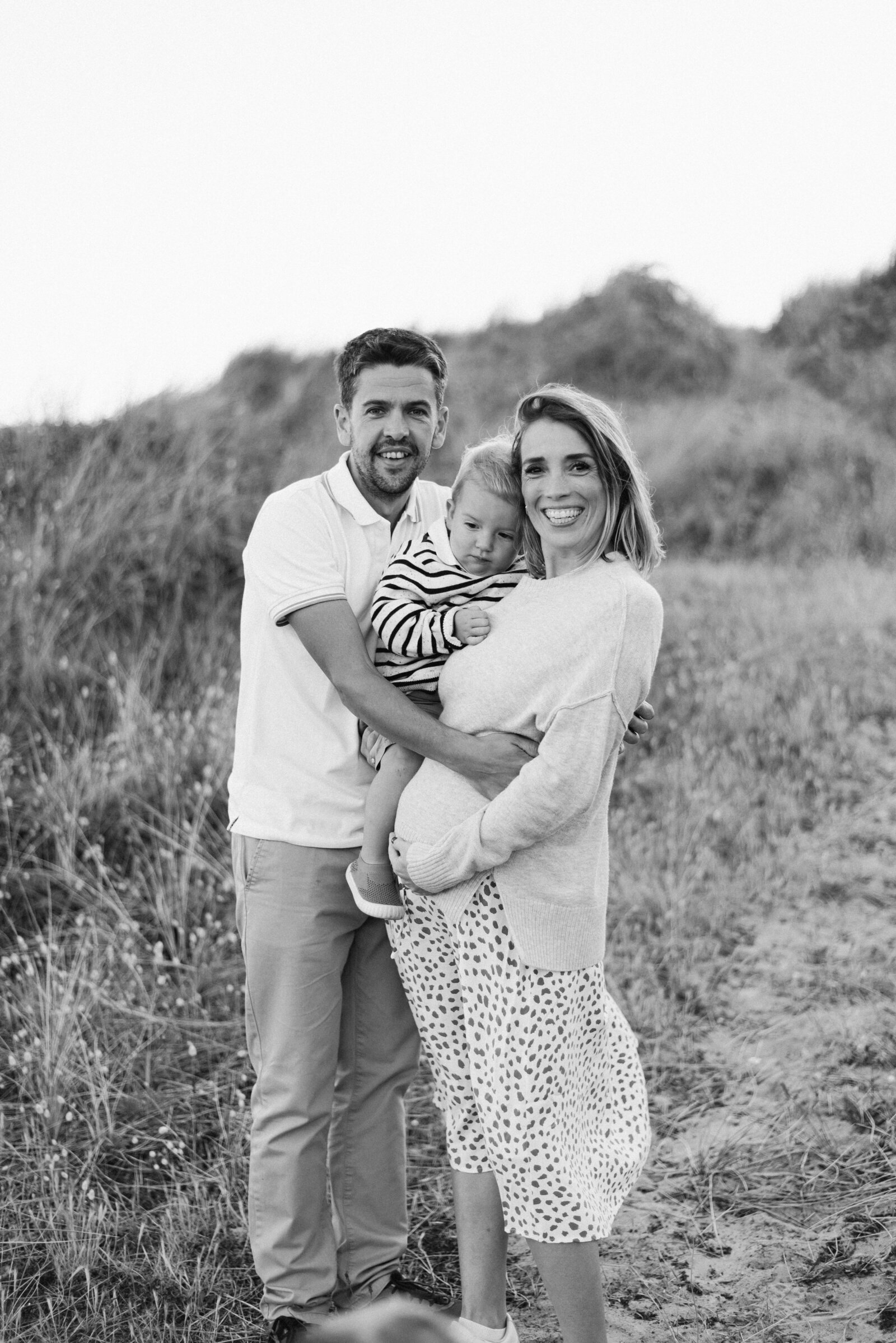 Mum and dad holding their baby during billingshurst family photoshoot