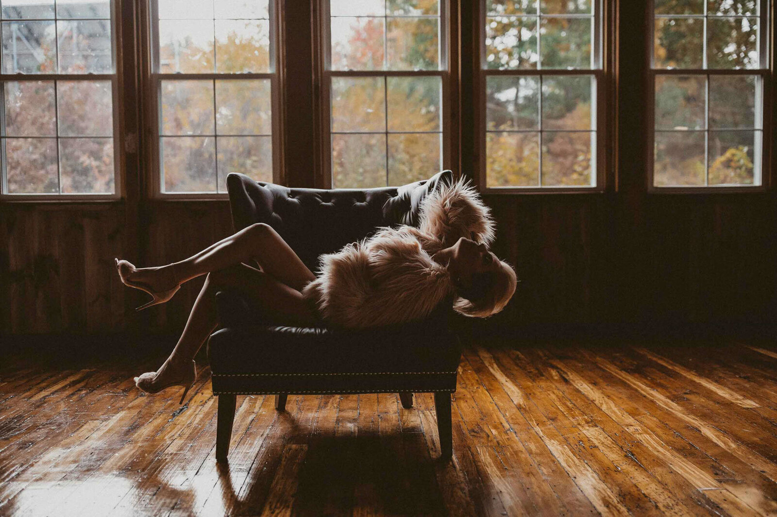 woman in a pink cotton cloth laying on the couch