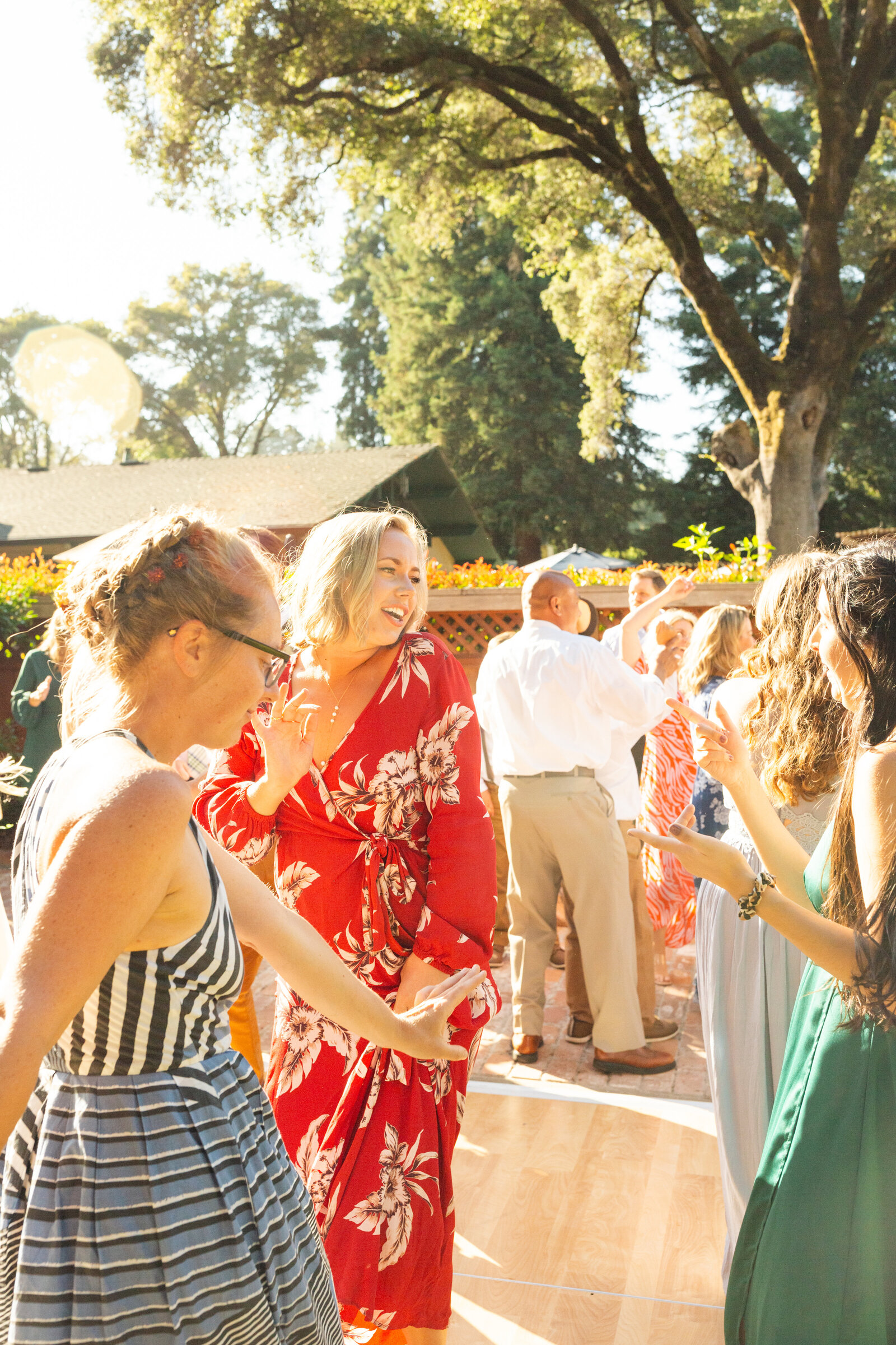Colorful wedding reception in Santa Cruz, California in the redwood trees.