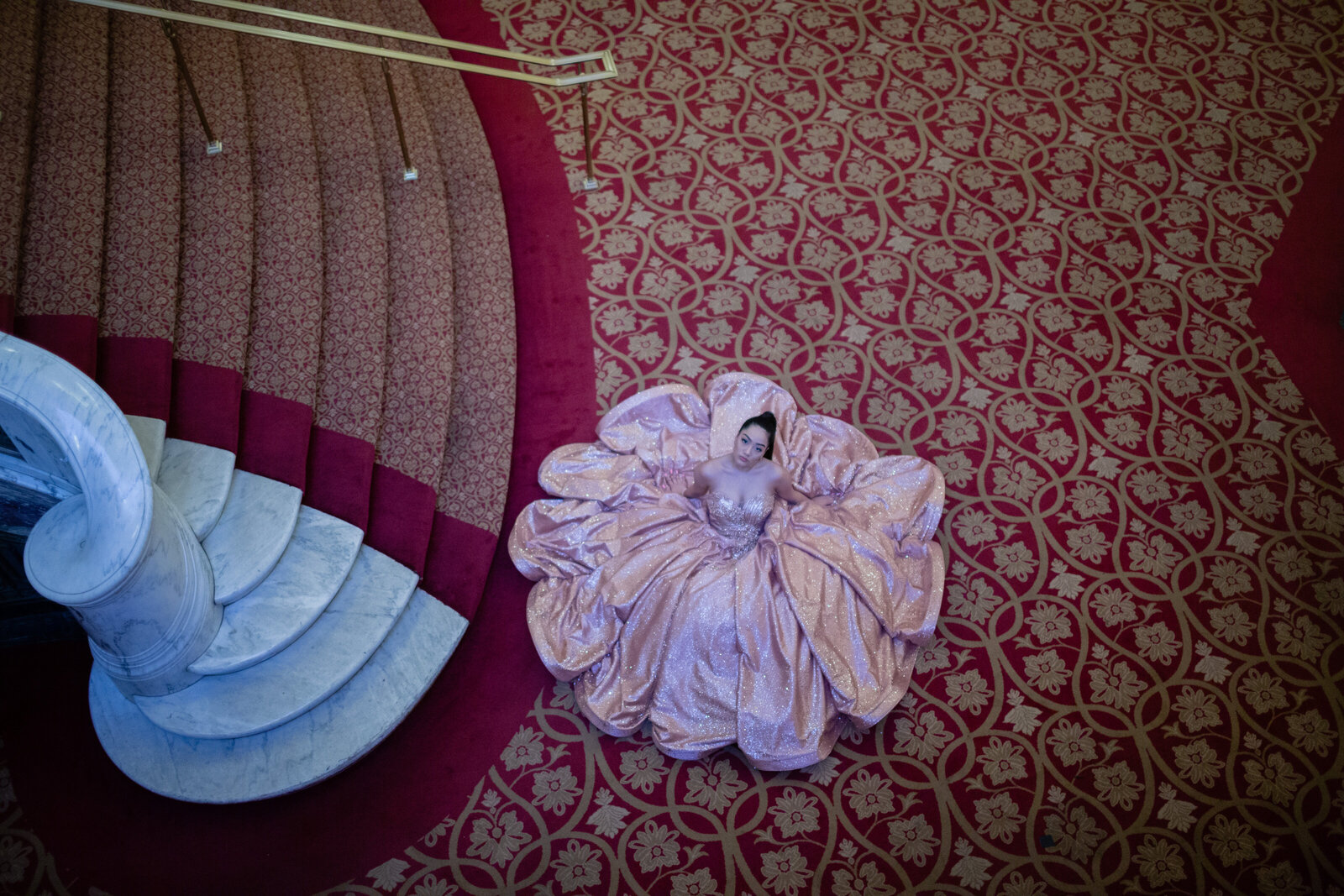 A captivating quinceañera portrait that highlights both the intricate gown details and the grand architecture of the Ohio Theater at Playhouse Square, Cleveland, Ohio.