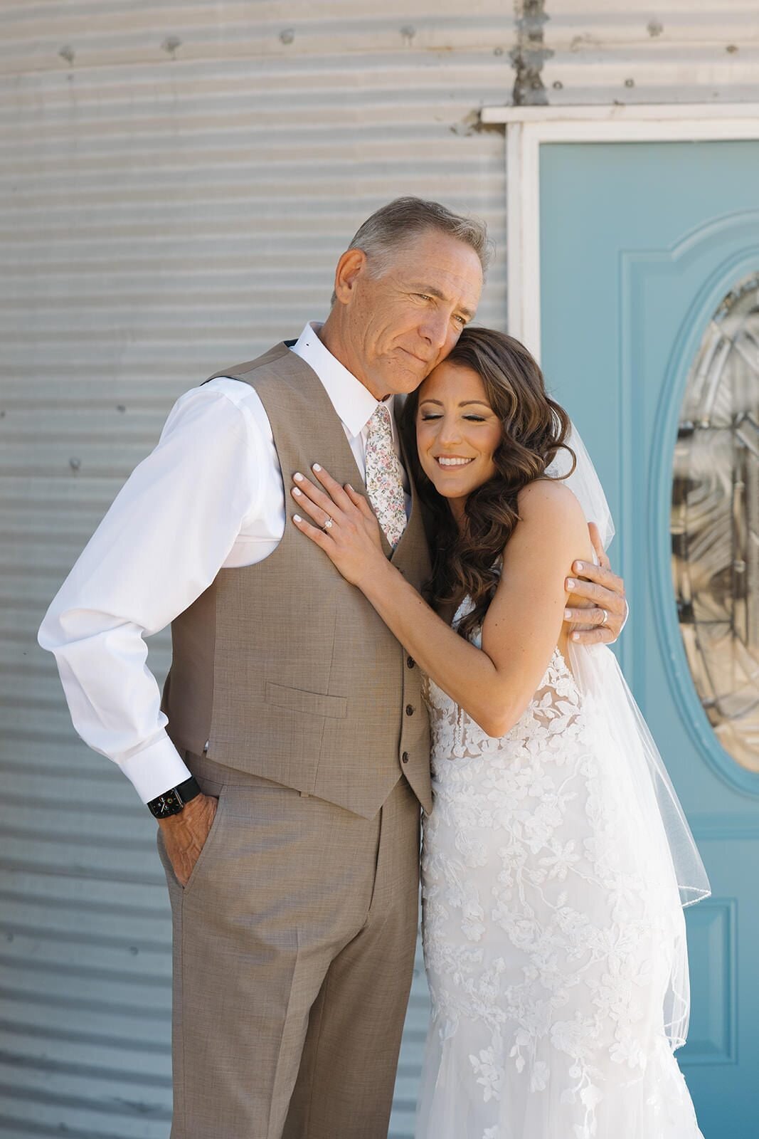 Bride smiling with her dad