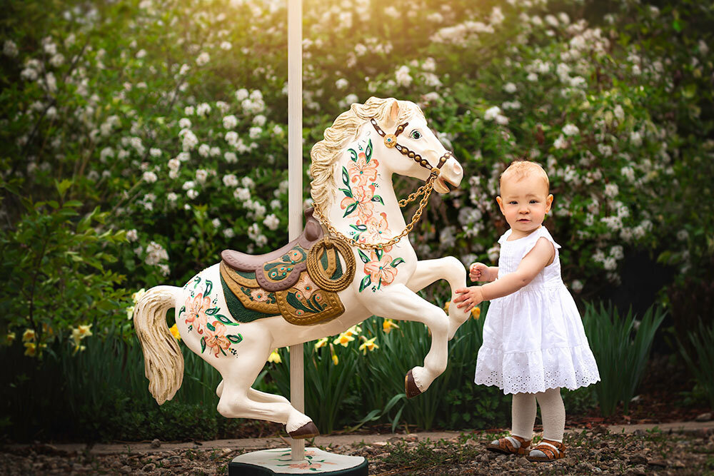 carousel-horse-milestone-18months-baby-magical-whimisical-spring-white-flowers-daffodils-small-farm-whimisical-fine-art-photography