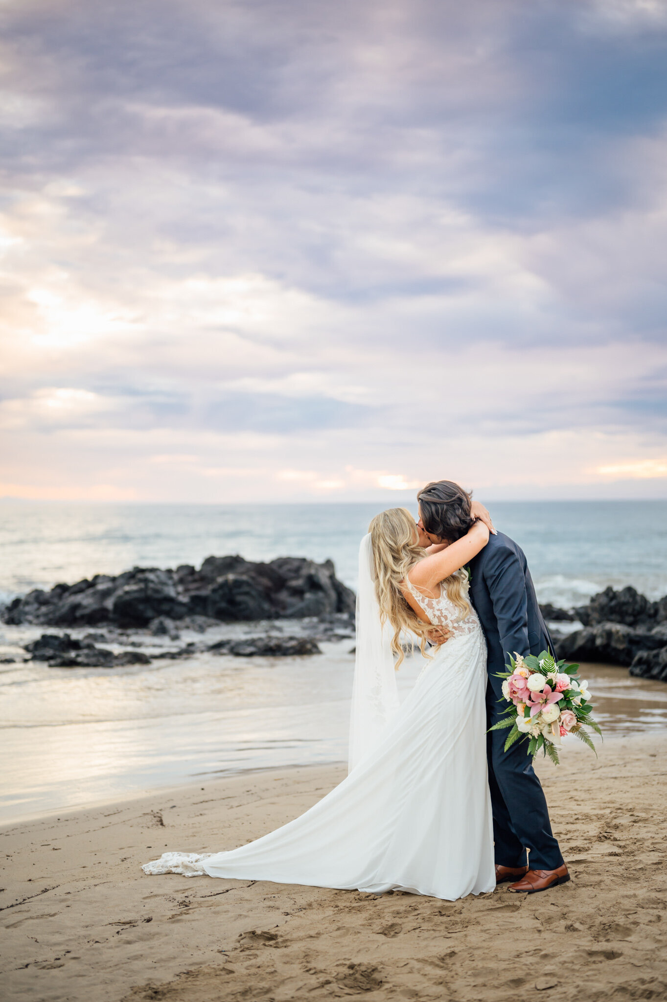 hawaii wedding day embrace at the beach