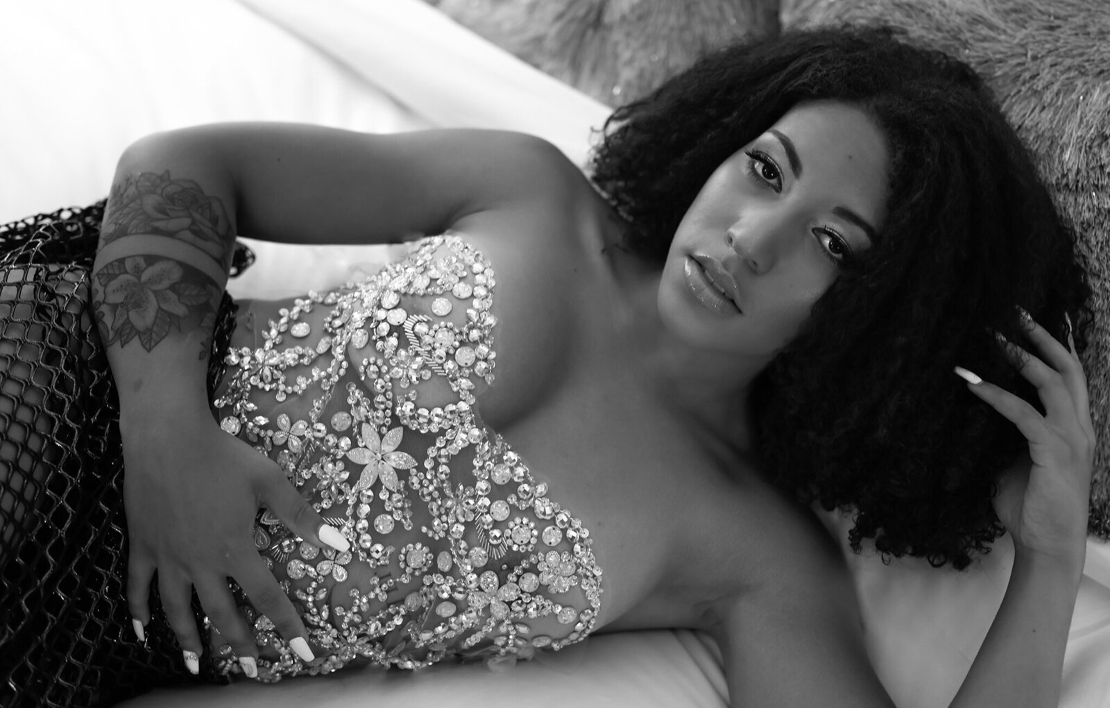 Savannah Georgia Boudoir Photography and Glamour boudoir portrait of beautiful black girl in bling lingerie in black and white