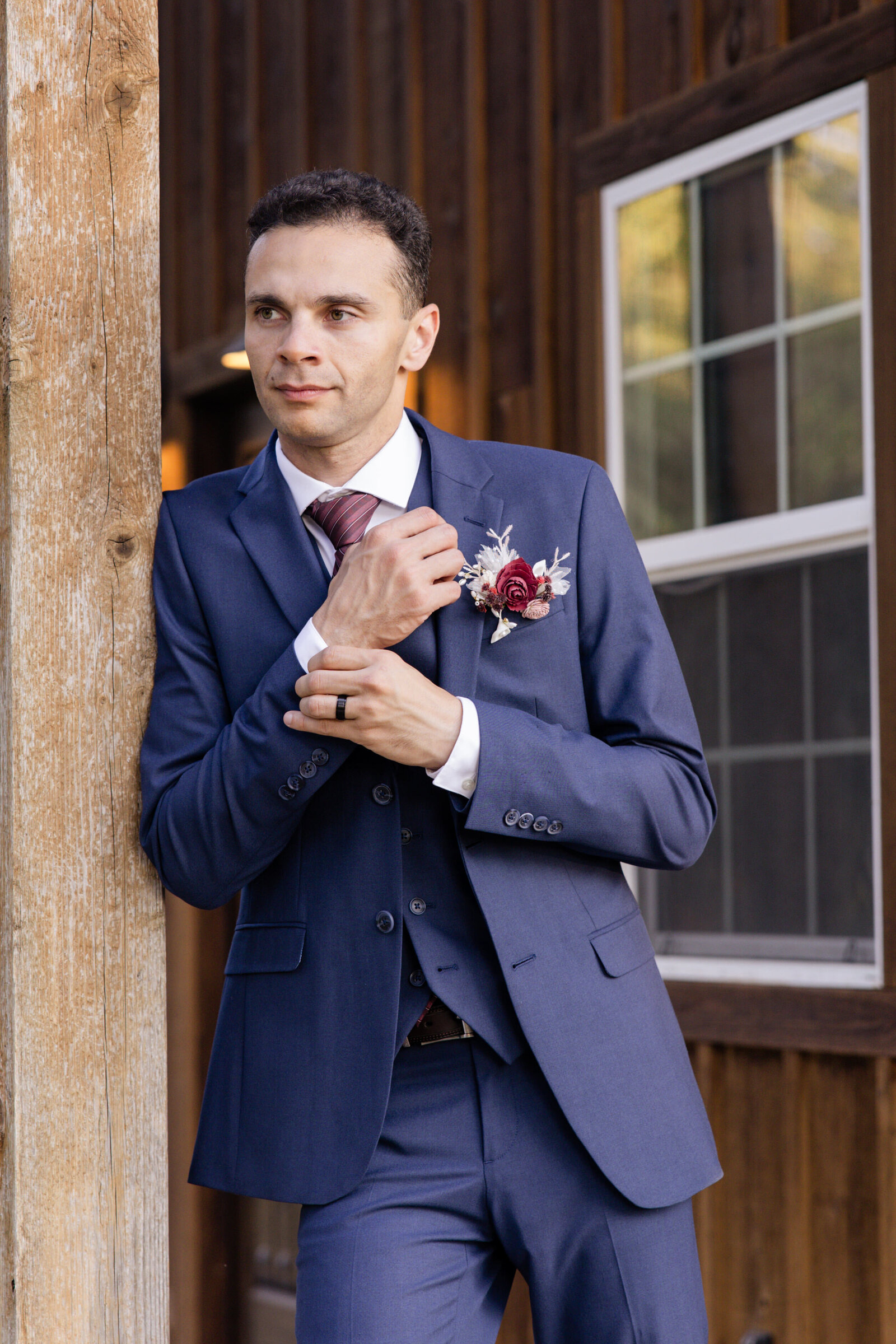 Outdoor solo photoshoot of groom before ceremony