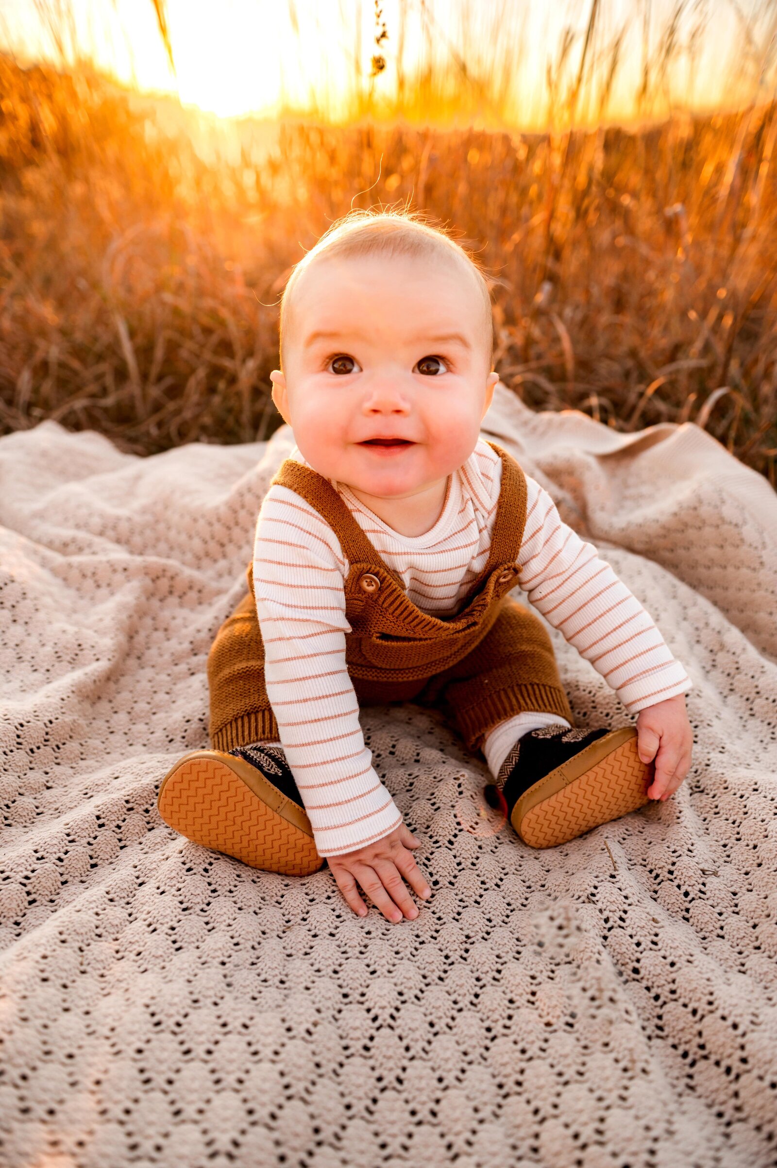 6 month old baby boy on a blanket