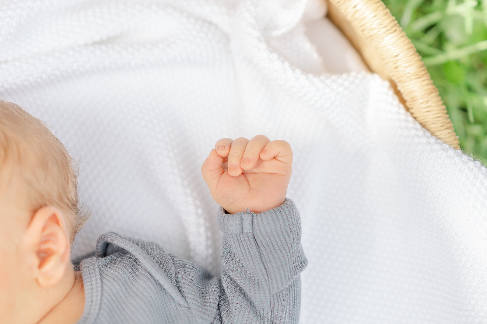 baby's hand during Loudoun County, VA backyard newborn photo