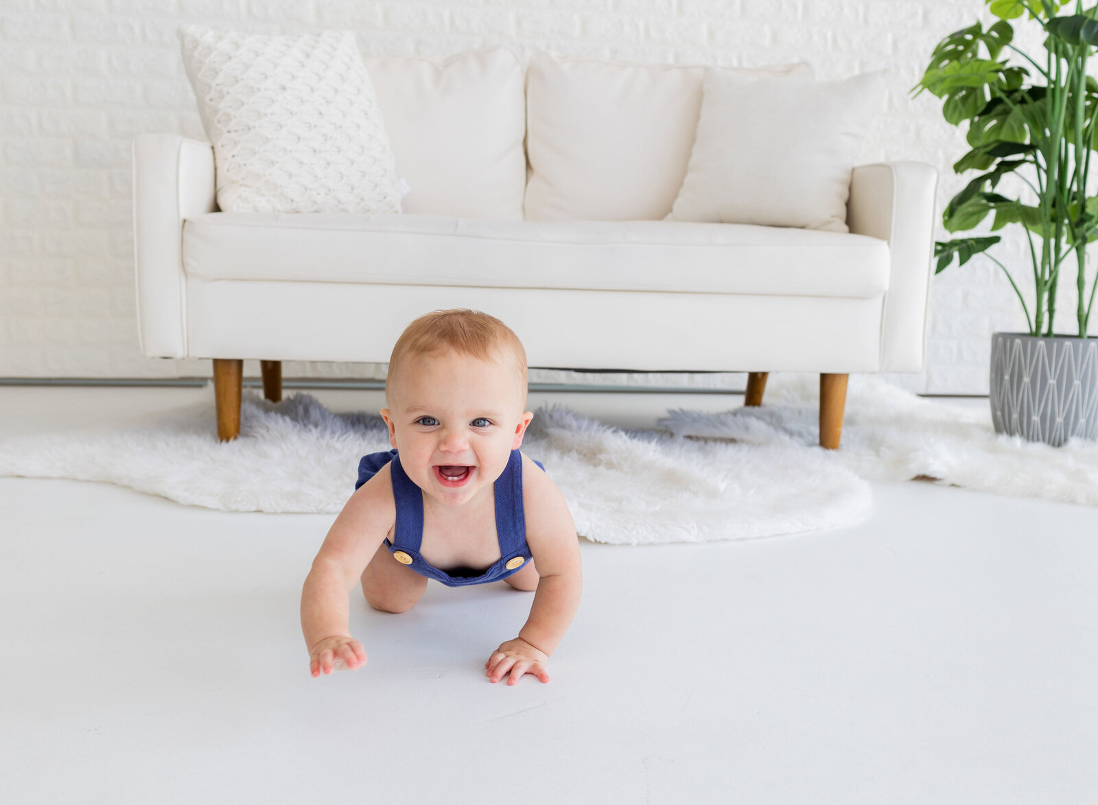 one year old boy smiling