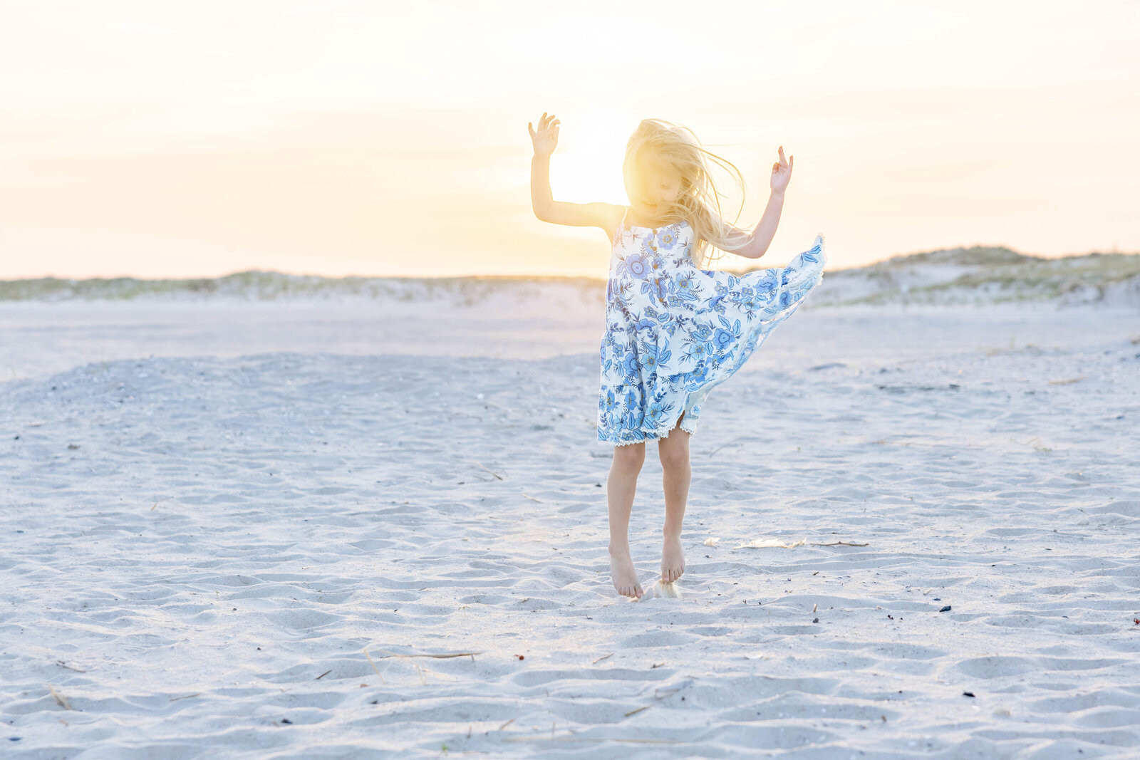 Girl dancing in the sunset