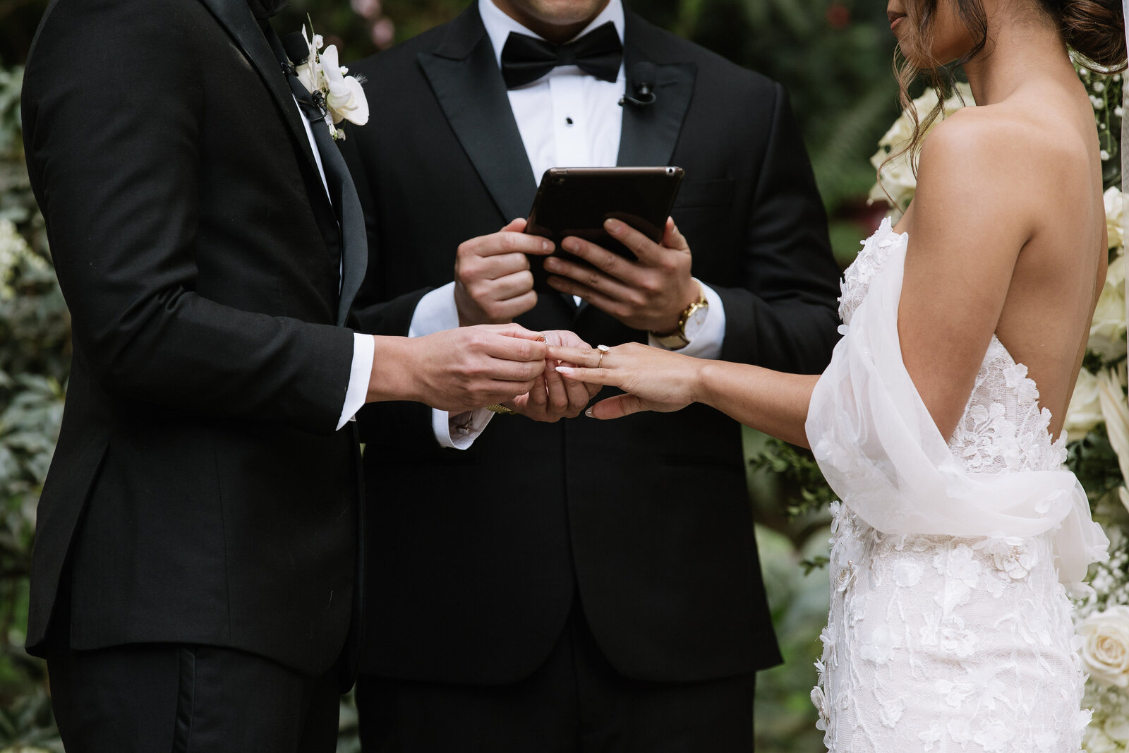Couple exchanges rings during intimate ceremony taken by Olympia, Washington wedding photographer, Erica Rochelle Photography
