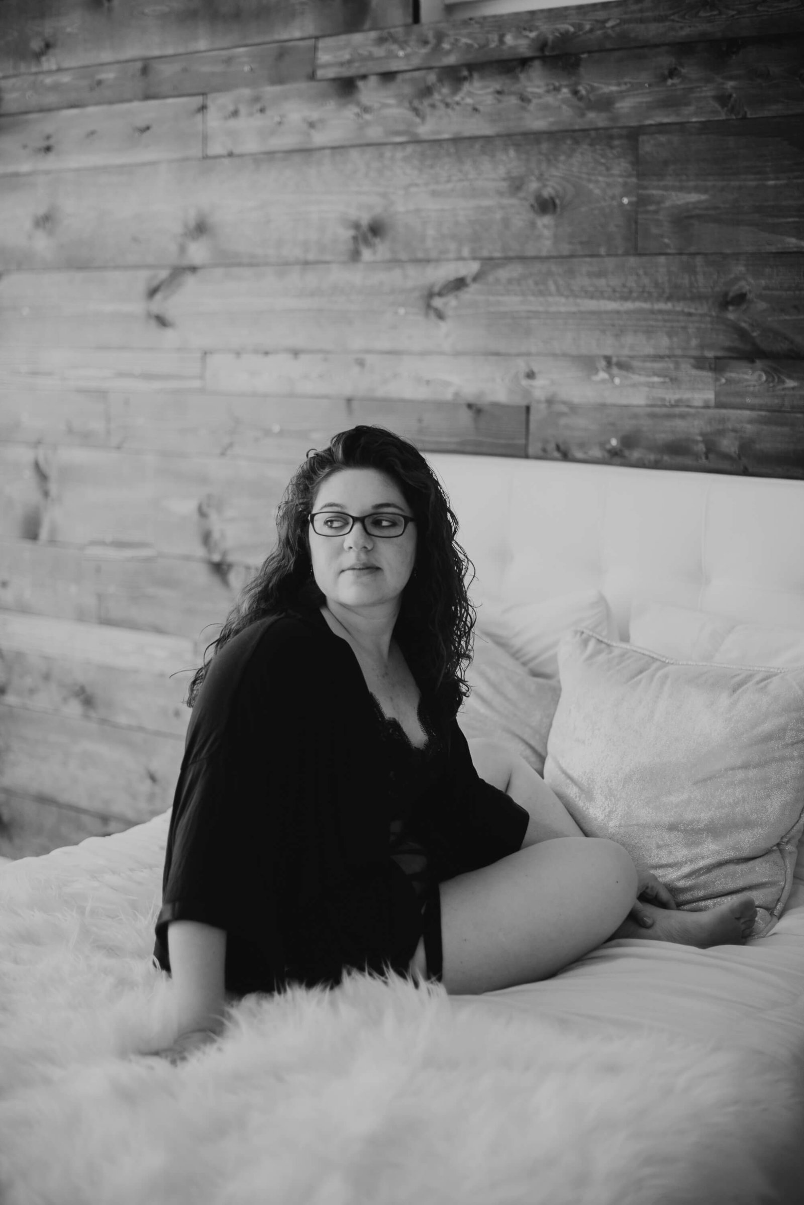 Liv Lyszyk Photography captures mom in self love boudoir session on bed