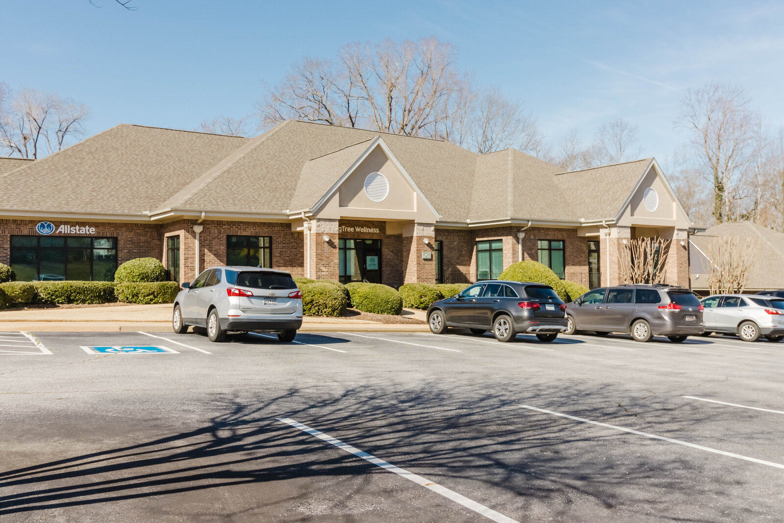 Exterior of LivingTree Wellness building in Greenville, SC, where Relax Revive & Thrive provides holistic massage, energy work, and self-care services