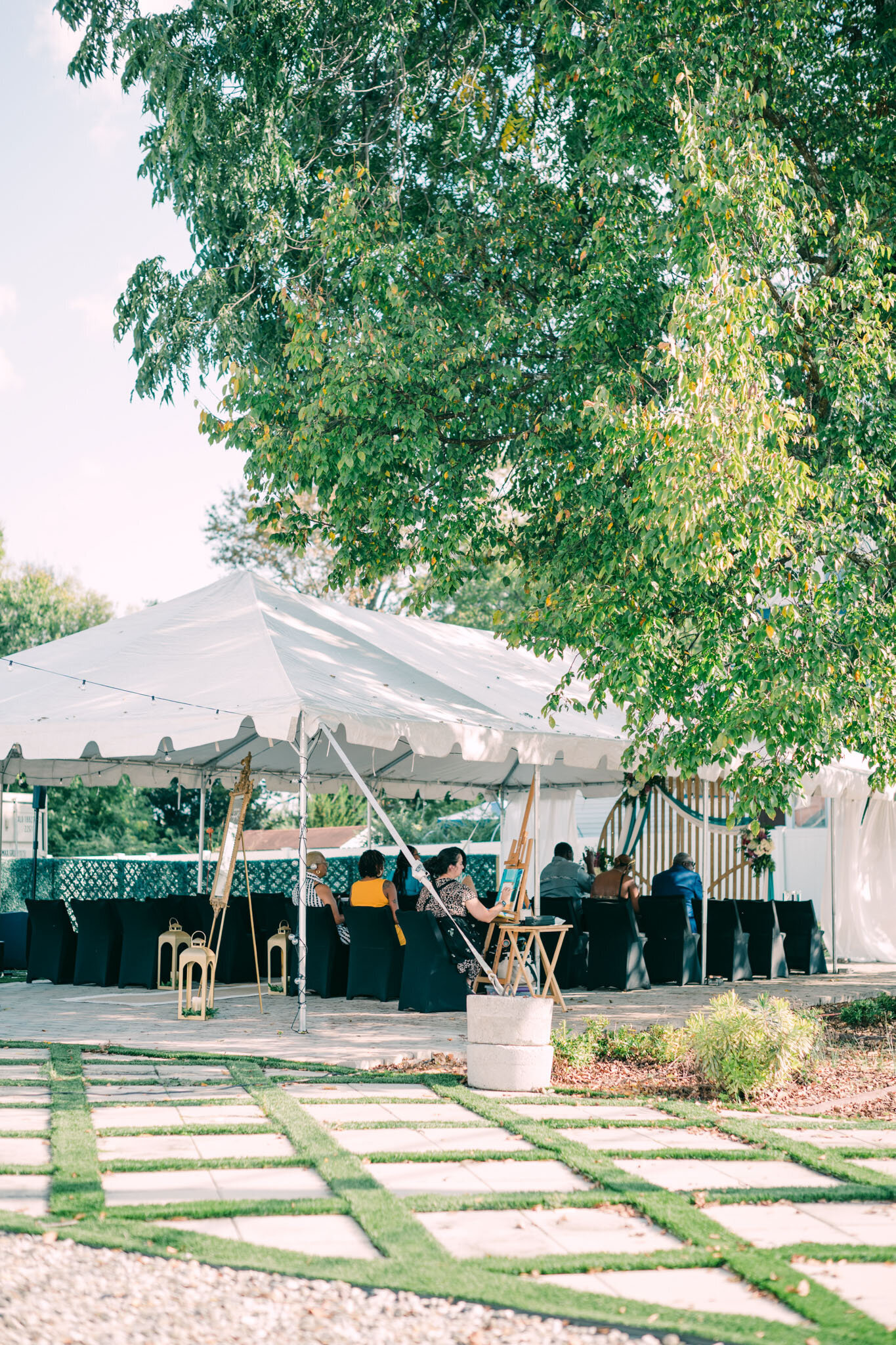 Wedding tent with guests visible