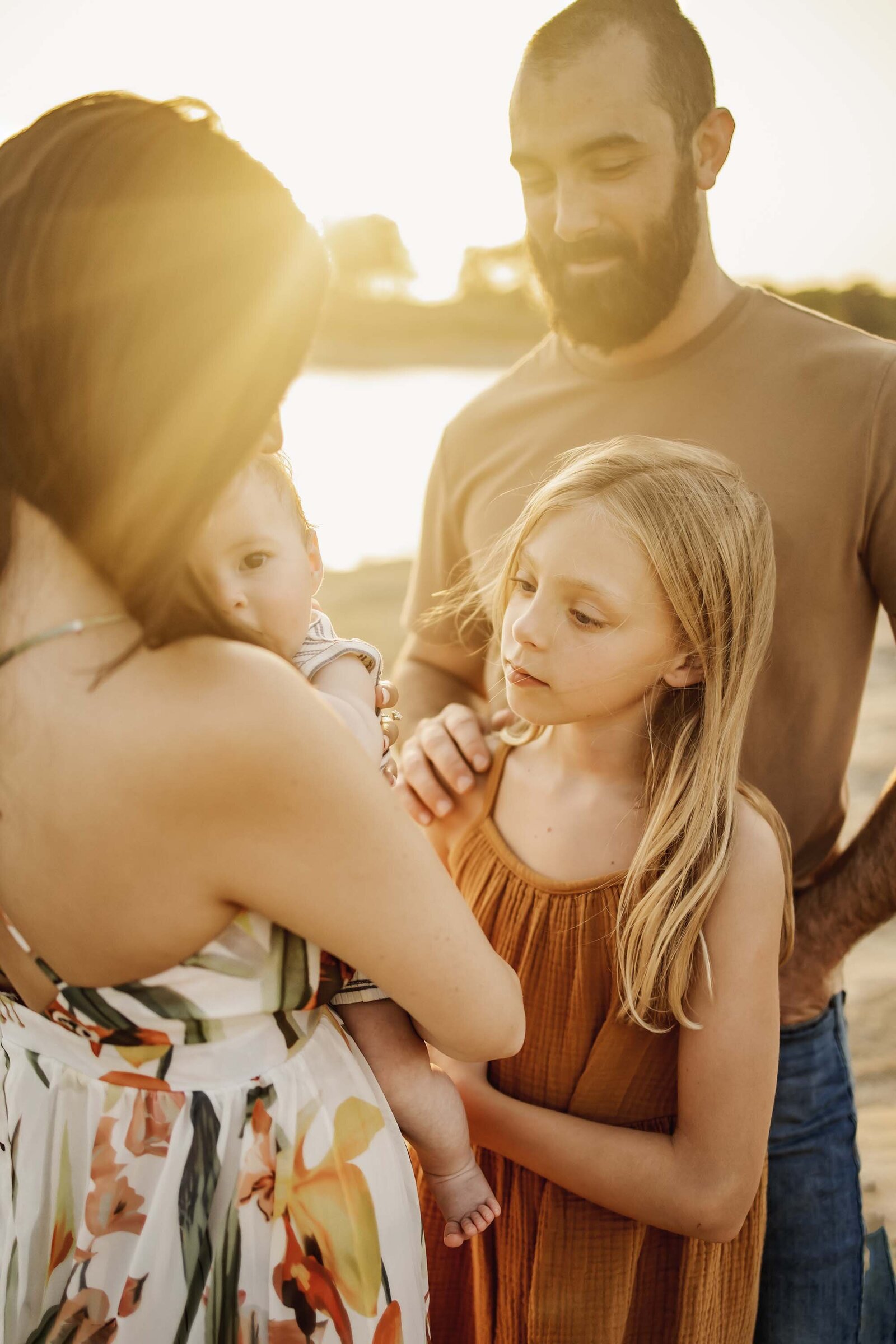 a family at a golden hour session in Flower Mound Texas