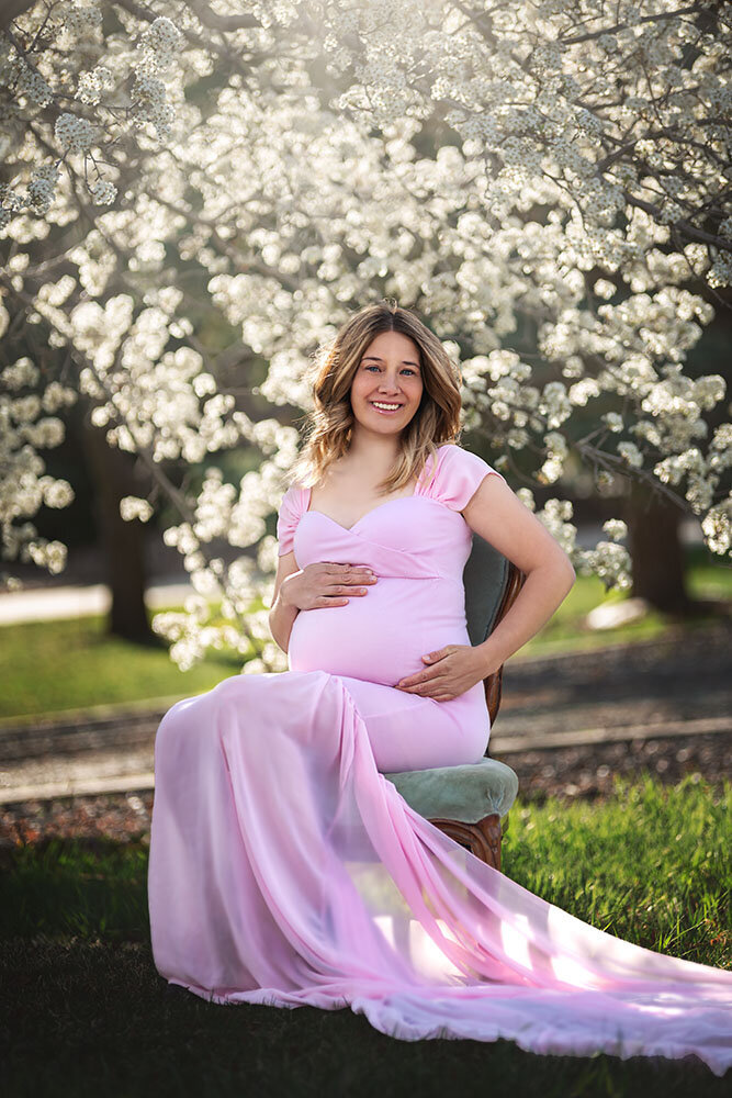 timeless-maternity-portrait-elegant-spring-white-blossoms-victorian-vintage-chair-farmhouse-studio