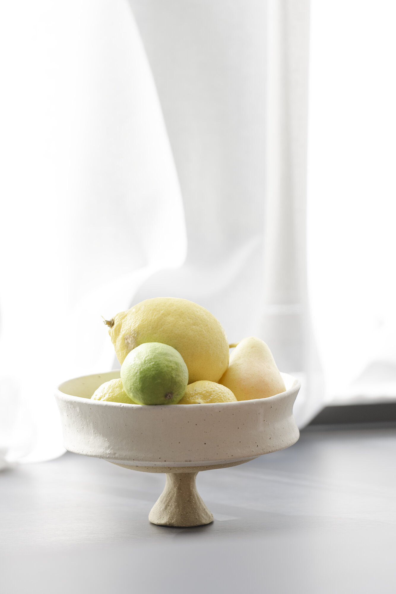 lemons & limes & crystal pear footed bowl light web 2000px