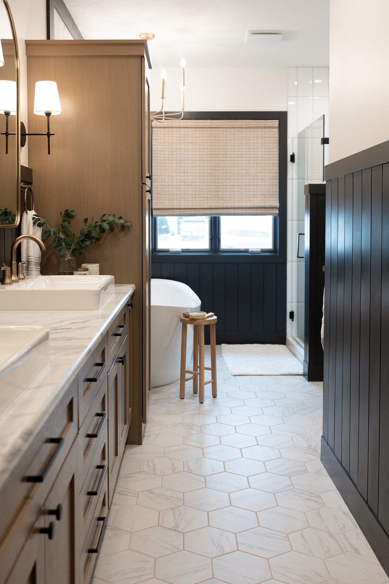 michele rosenboom design classic primary bath transformation white marble floors with wooden cabinet