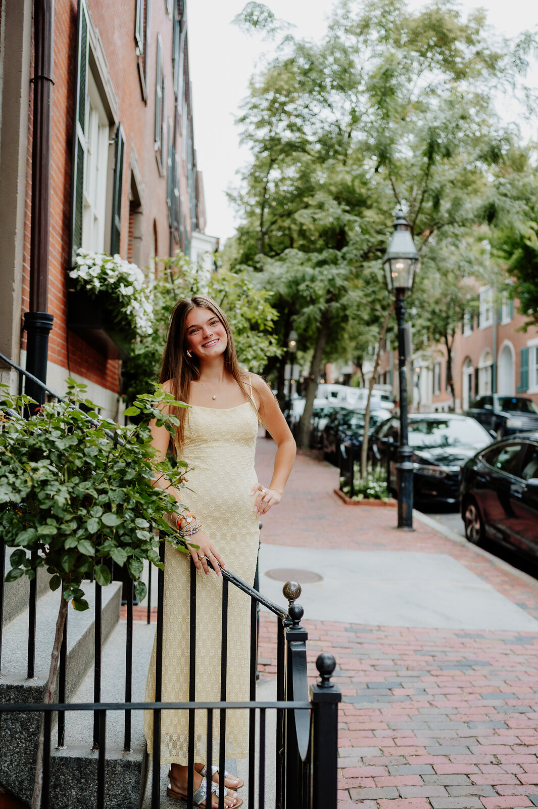 Girl in Boston during her senior session walking down the street