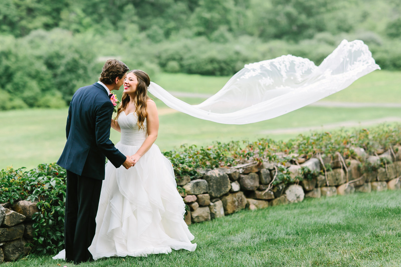 bride and groom kissing at the Hill+stead Museum