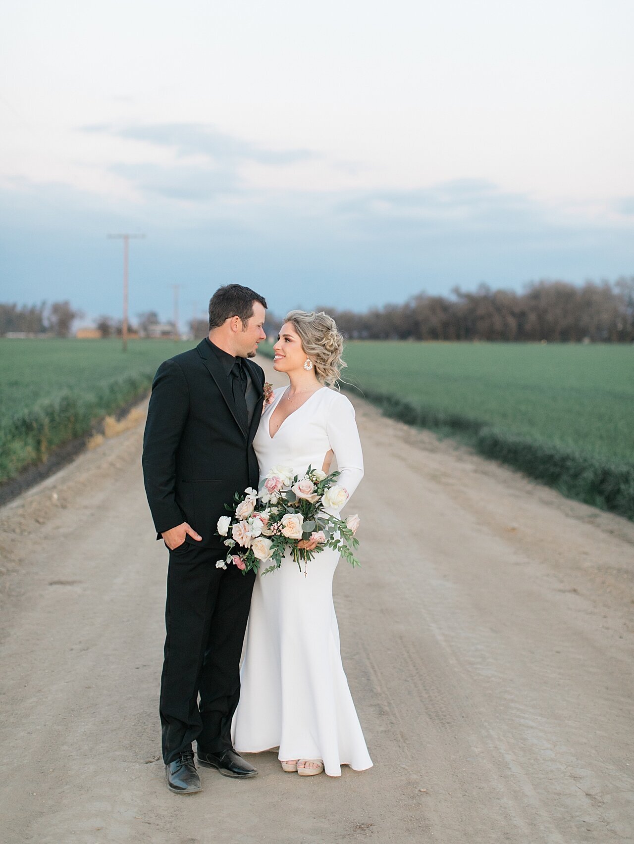 Emerald grace floral design wedding with Lauren Westra photography almond orchard bride and groom soft blush color palette central california weddings_2518