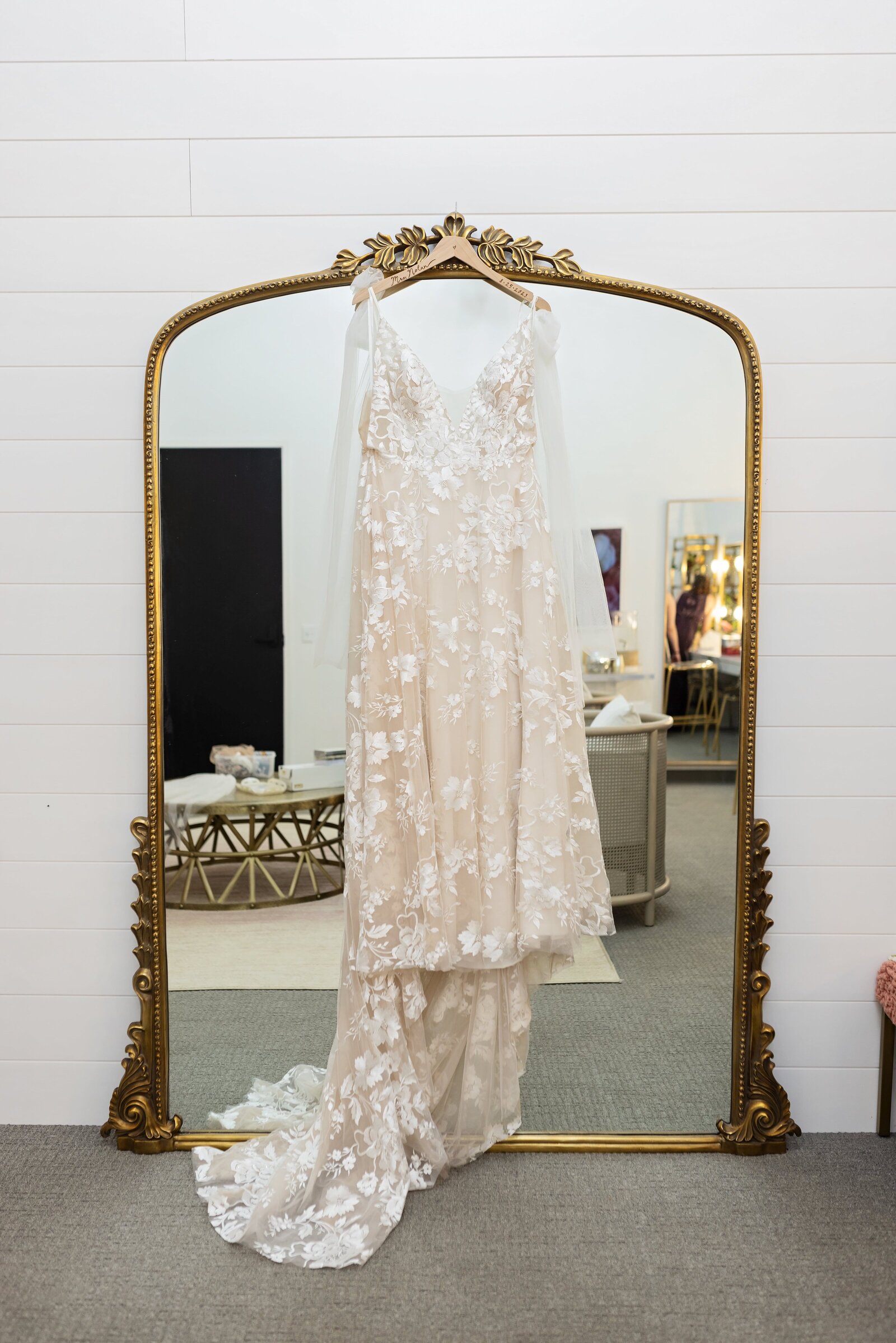 wedding-dress-hanging-on-mirror