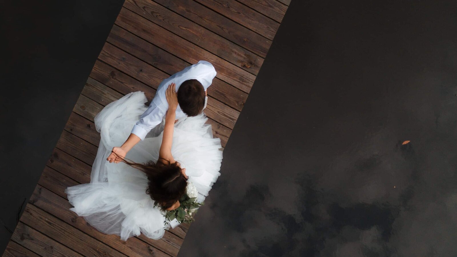 Couple Dancing by the water in Williamsburg, Virginia