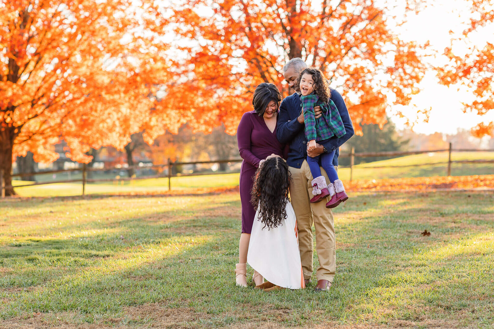 A family interacting with each other during their Northern Virginia family photography session.
